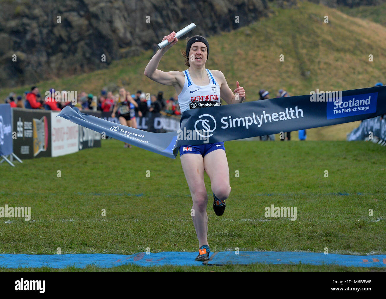 Great Britain's Laura Muir crosses the finish line to win the Simplyhealth Great Edinburgh XCountry 4x 1000 metre relay race for team GBR during the Great Edinburgh International XCountry 2018 in Holyrood Park, Edinburgh. PRESS ASSOCIATION Photo. Picture date: Saturday January 13, 2018. Photo credit should read: Mark Runnacles/PA Wire. Stock Photo
