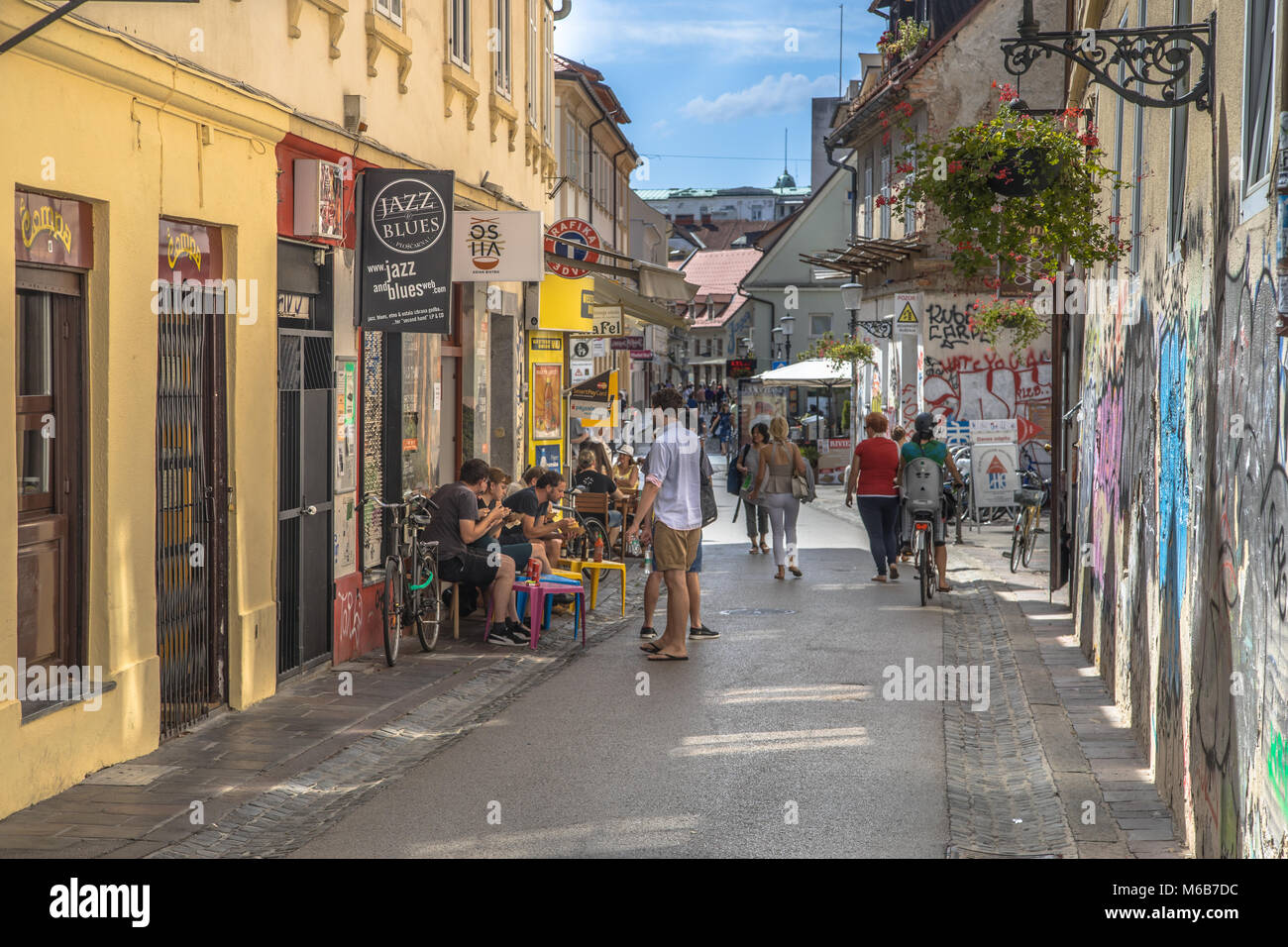LJUBLJANA, SLOVENIA, AUGUST 11 2017: Trubarjeva cerna vibrant street with cafes and restaurant Stock Photo