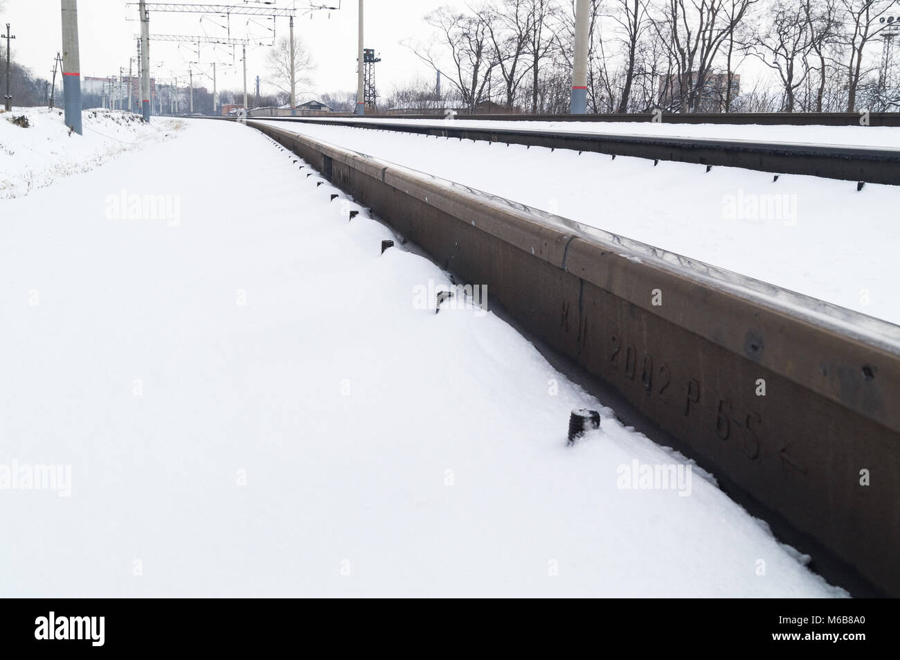 Snow On Rails Winter and snowstorm on the railroad tracks. snow-covered rails Stock ...