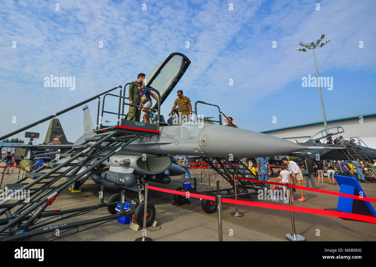 Singapore  - Feb 10, 2018. People visit cabin of Lockheed Martin F-16 Fighting Falcon aircraft belong to the Singapore Air Force at the 2018 Singapore Stock Photo