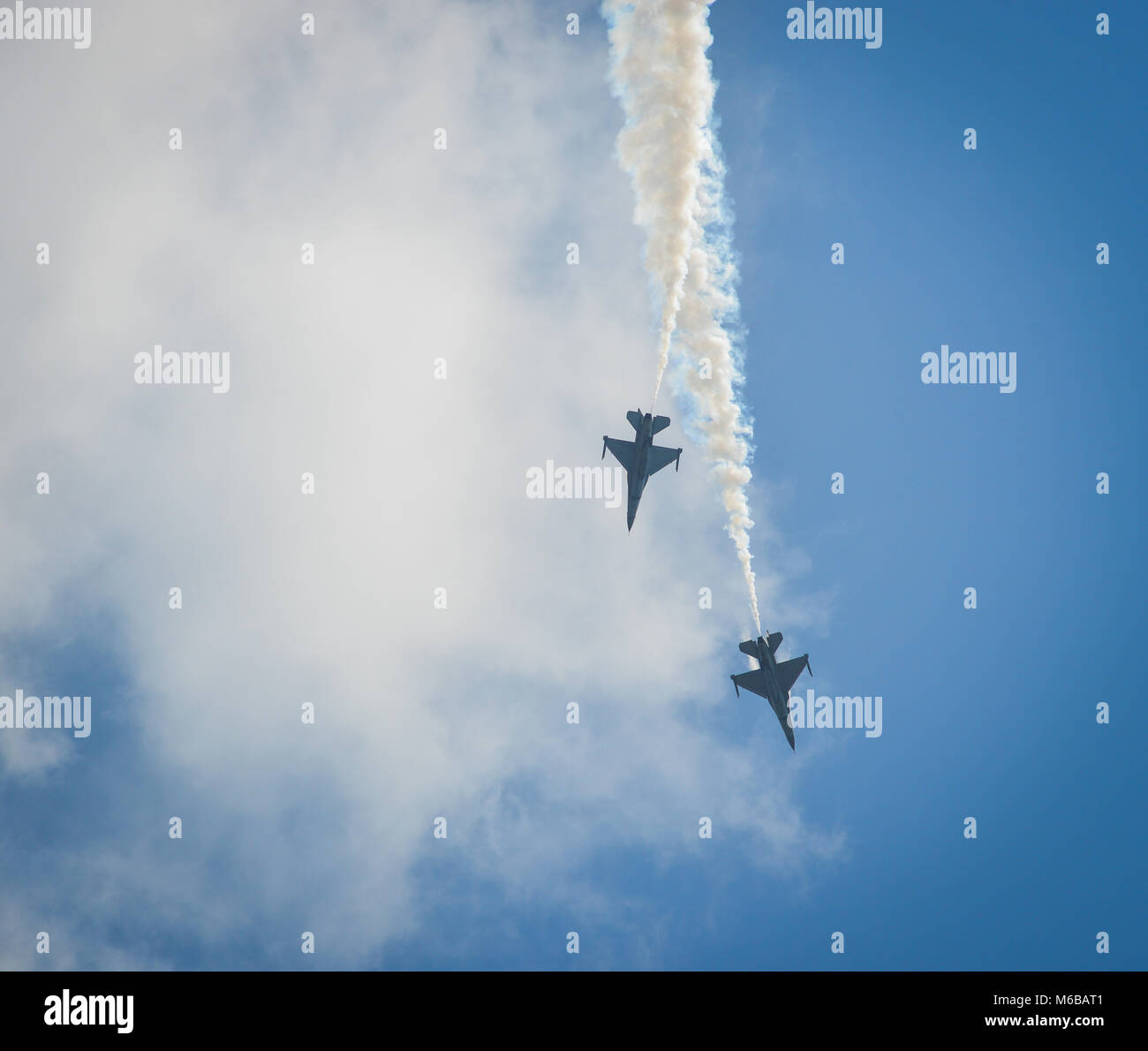 Fighter jets flying under blue sky in Singapore Stock Photo - Alamy