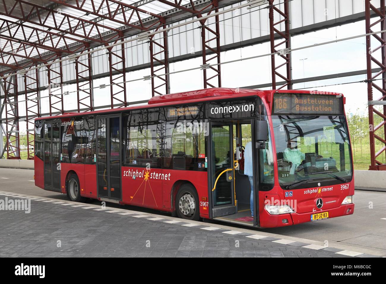 AMSTERDAM, - JULY 10, 2017: People ride Connexxion city bus in Amsterdam. Other public transportation bus companies in Amsterdam GVB a Stock Photo Alamy