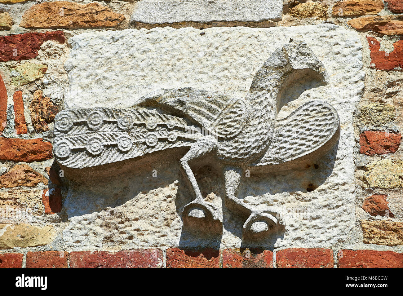 Roanesque relief sculpture details on the 11th centruy portico of the Church of Santa Maria, Benedictine Abbey of Pomposa, Emilia-Romagna, Italy. Stock Photo