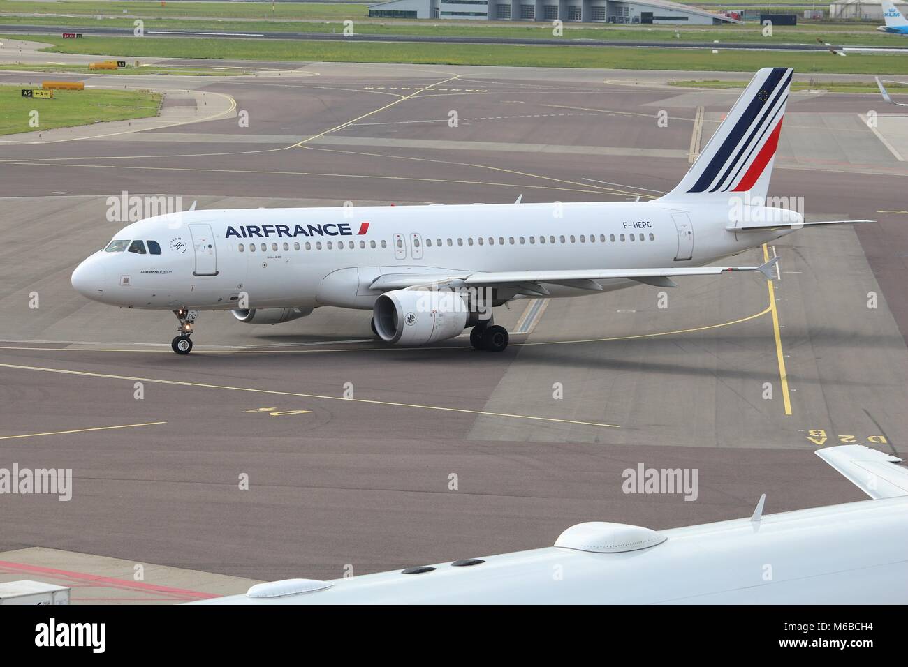 AMSTERDAM, NETHERLANDS - JULY 11, 2017: Air France Airbus A320 at Schiphol Airport in Amsterdam. Schiphol is the 12th busiest airport in the world wit Stock Photo