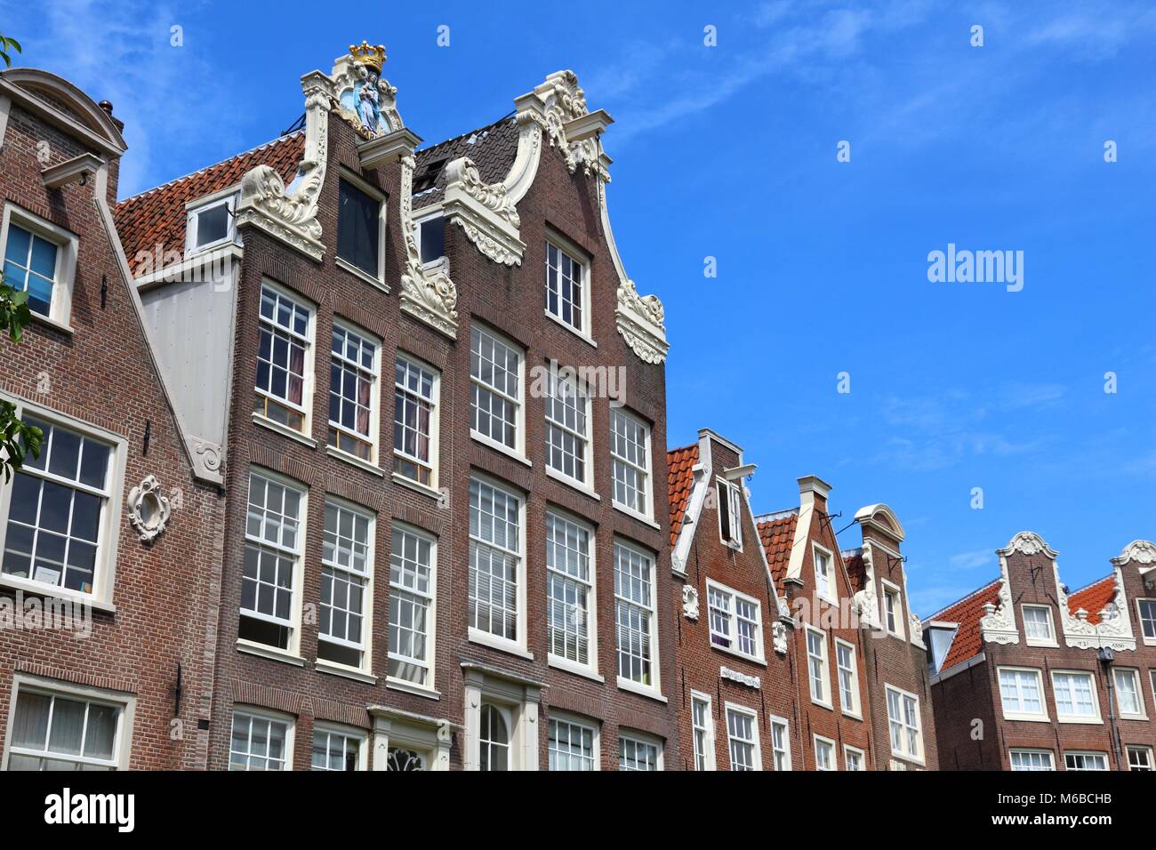 Amsterdam city architecture - Begijnhof residential buildings. Netherlands rowhouse. Stock Photo