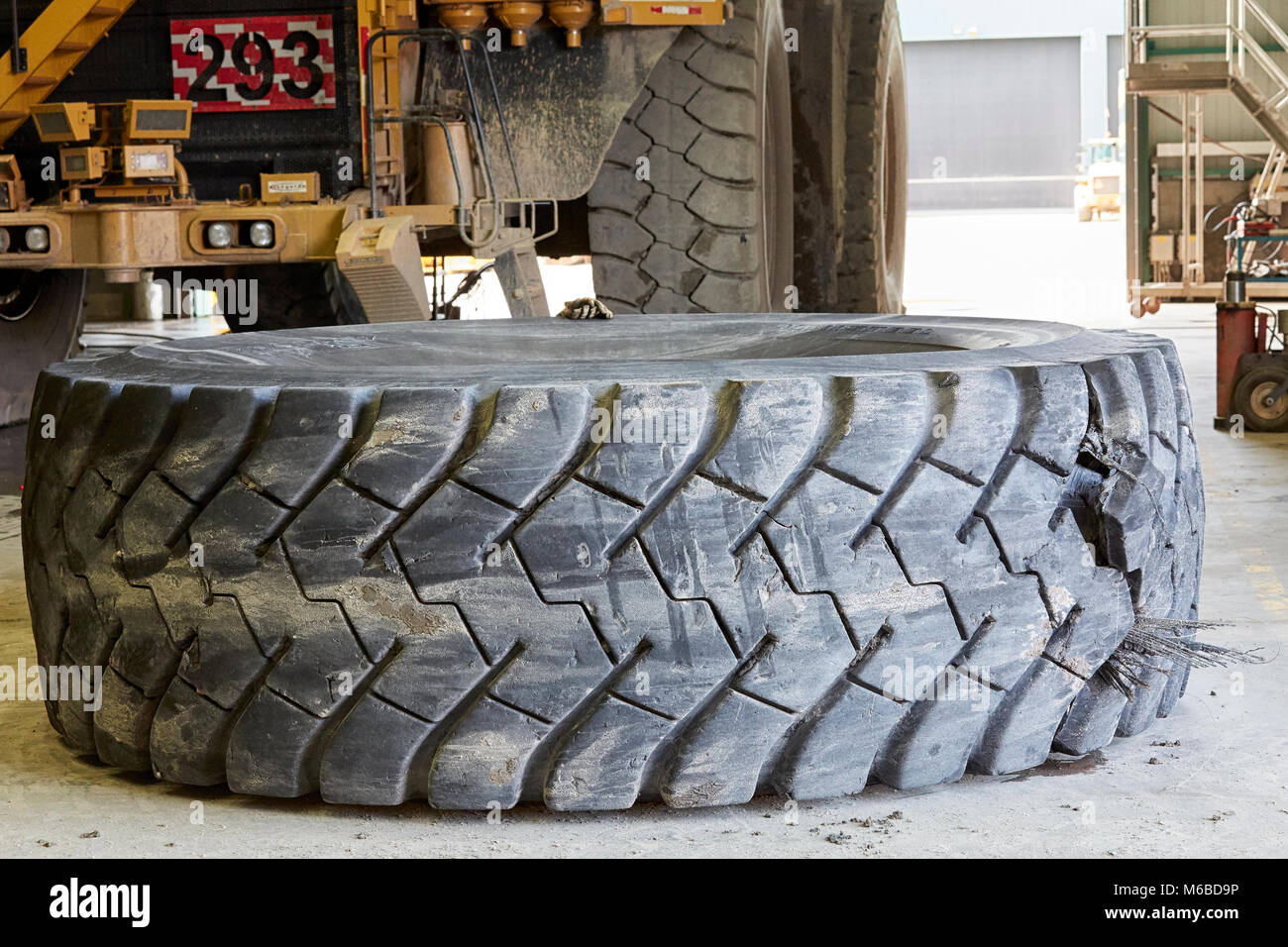 Tire of Caterpillar 16M Motor Grader at ArcelorMittal Mine, Mount Wright (Mount Wright), Fermont, Quebec Stock Photo
