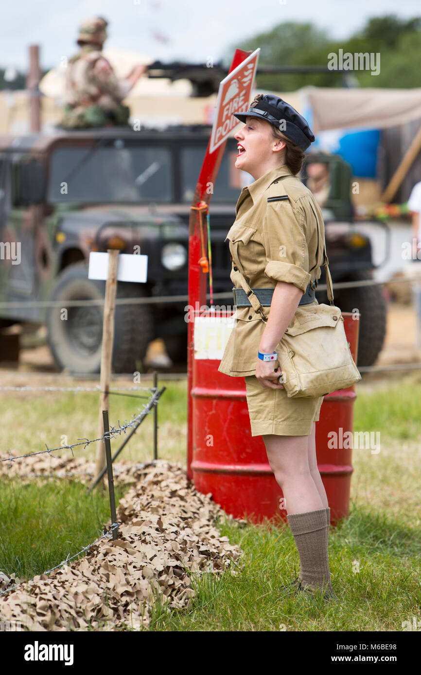 A young woman in army uniform at a War and Peace revival meeting Stock ...