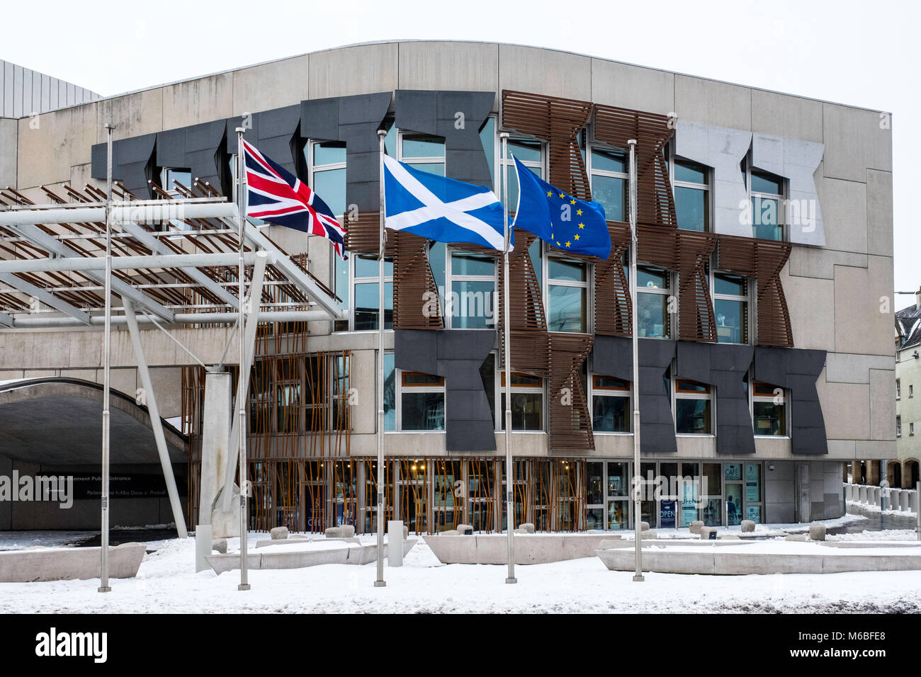 Flags flying outside Scottish Parliament building at Holyrood in Edinburgh, Scotland, United Kingdom Stock Photo