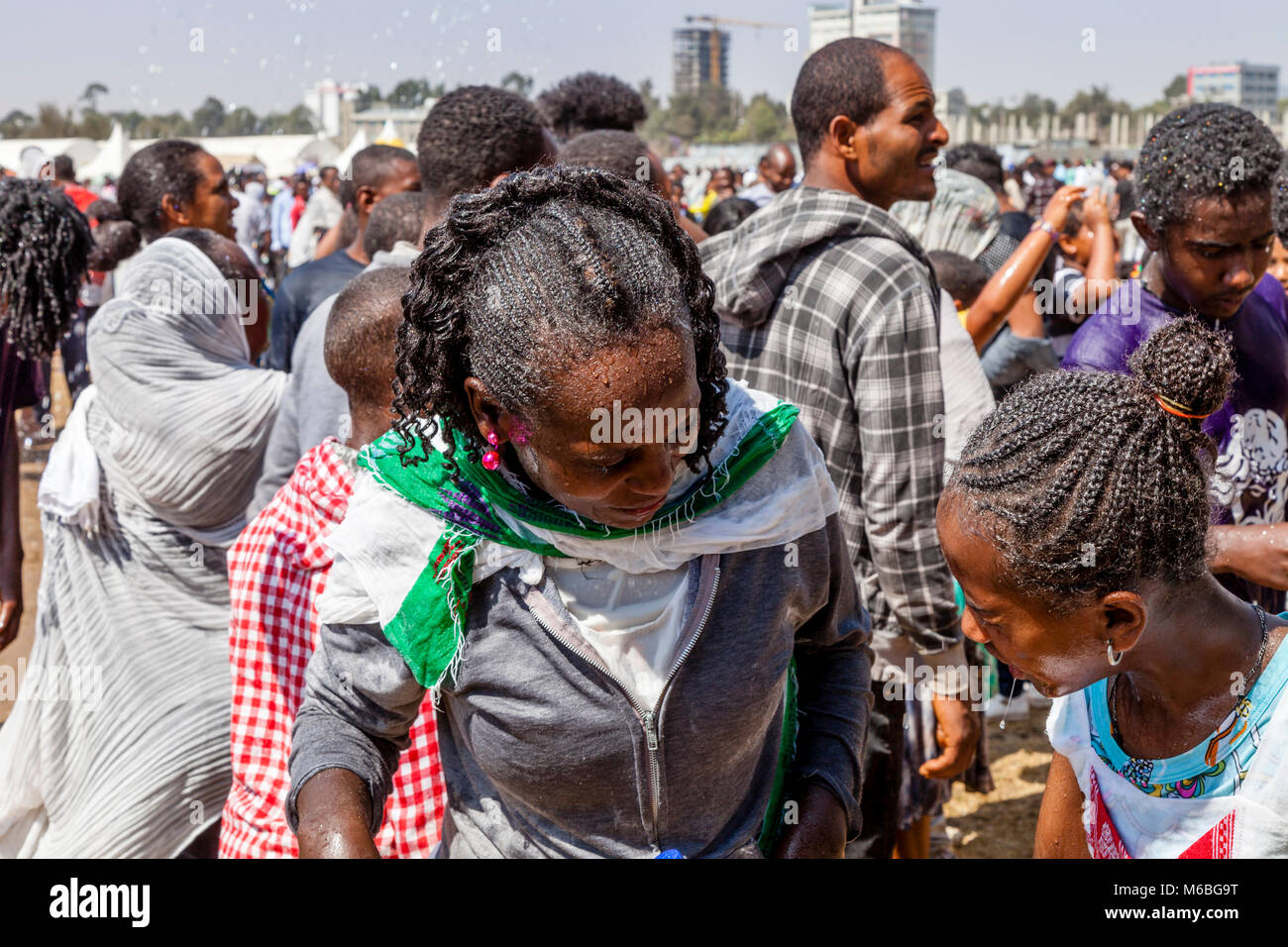 Ethiopian Christians Are Sprinkled With Blessed Water To Celebrate The Baptism Of Jesus In The Jordan River, Timkat (Epiphany) Addis Ababa, Ethiopia Stock Photo