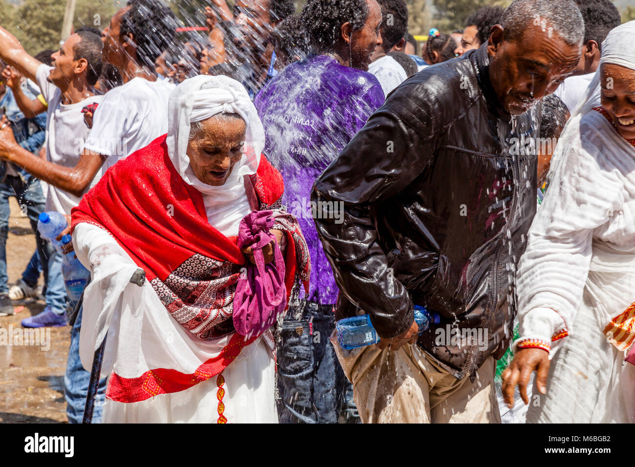 Ethiopian Christians Are Sprinkled With Blessed Water To Celebrate The Baptism Of Jesus In The Jordan River, Timkat (Epiphany), Addis Ababa, Ethiopia Stock Photo