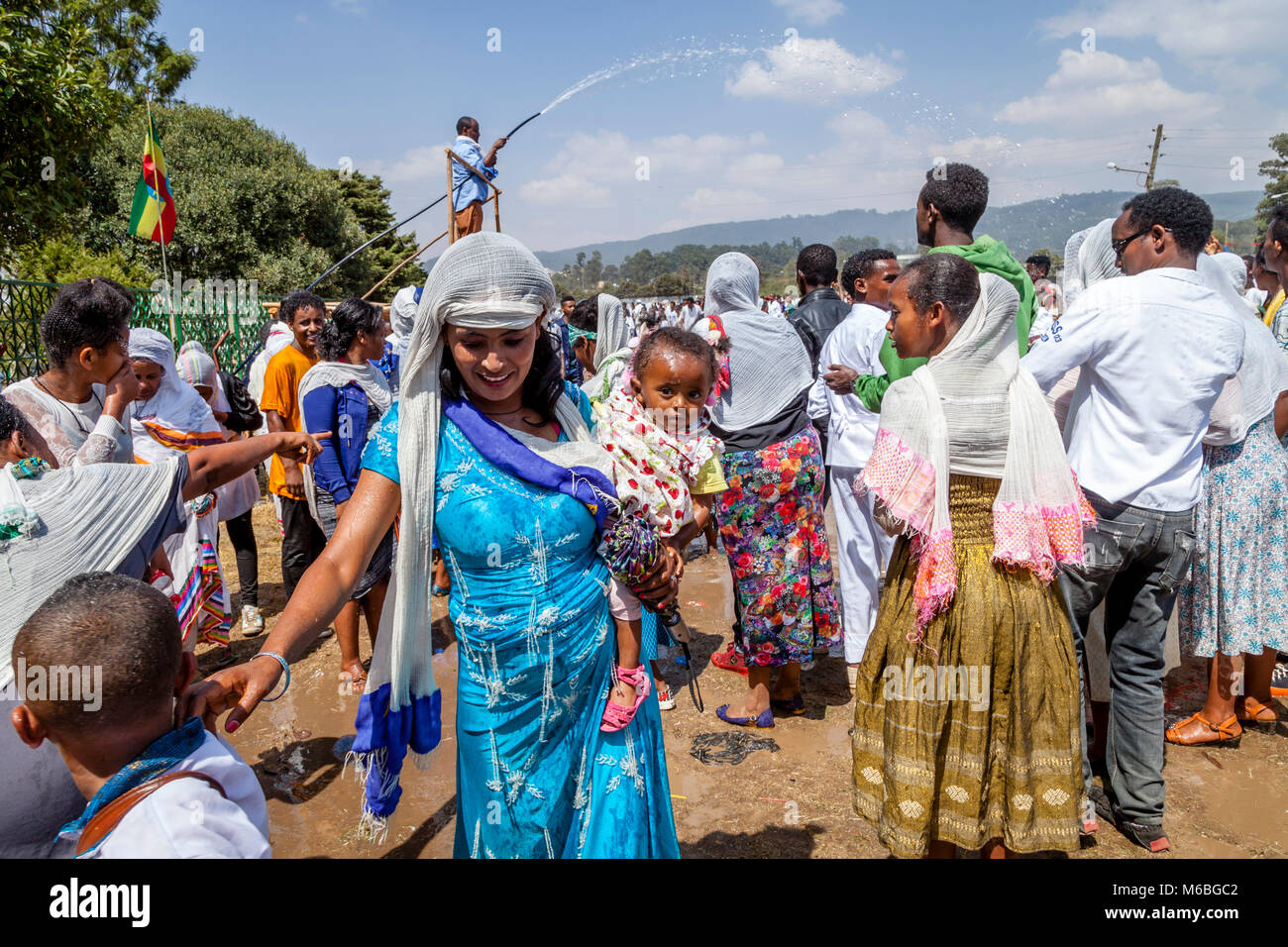 Ethiopian Christians Are Sprinkled With Blessed Water To Celebrate The Baptism Of Jesus In The Jordan River, Timkat (Epiphany), Addis Ababa, Ethiopia Stock Photo