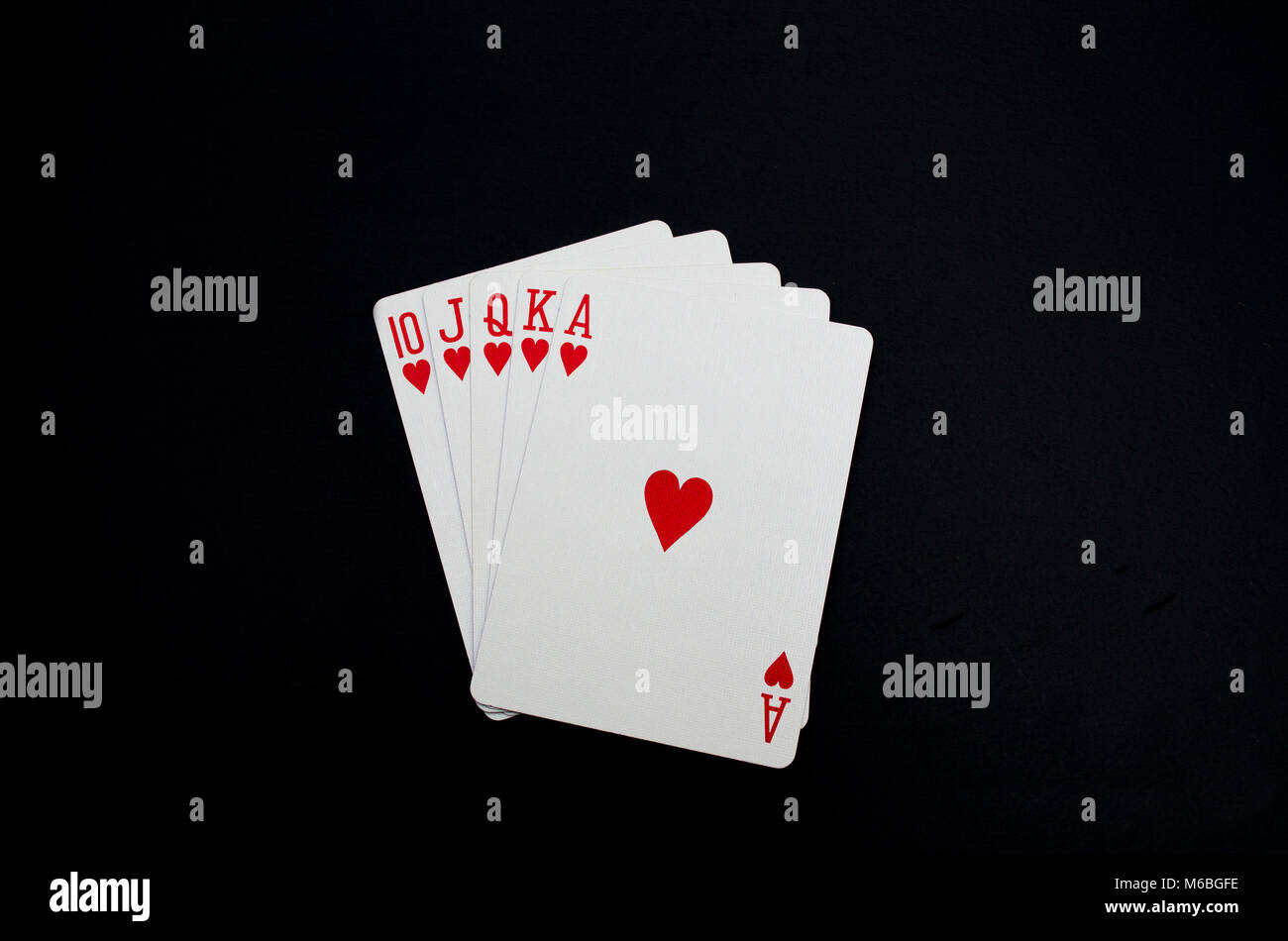 royal flush playing cards poker hand Stock Photo