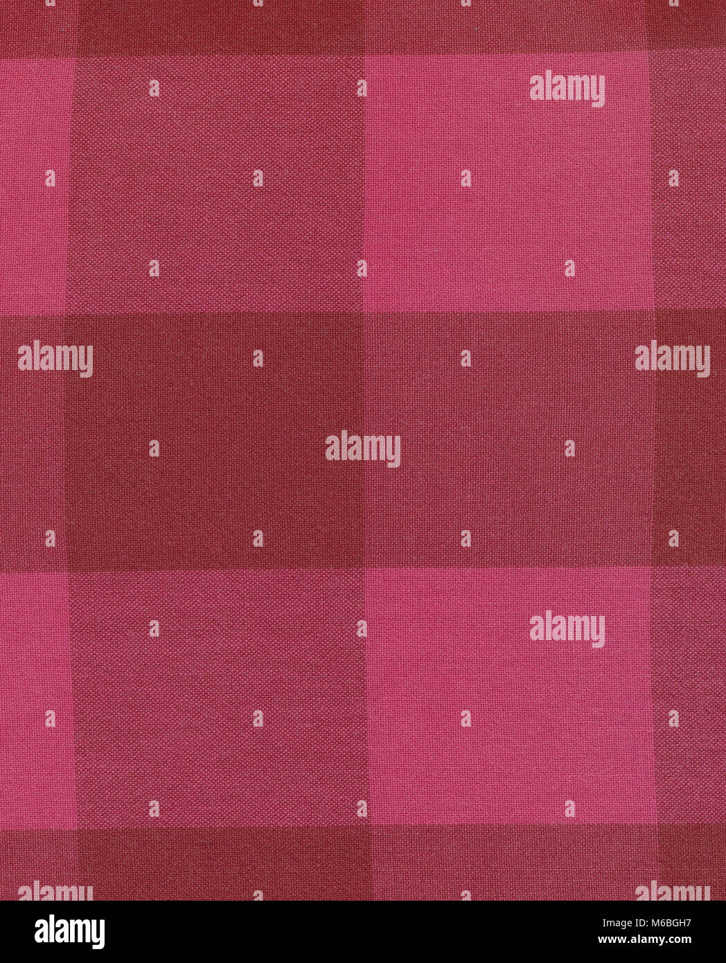 Red and pink checked cotton fabric Stock Photo - Alamy