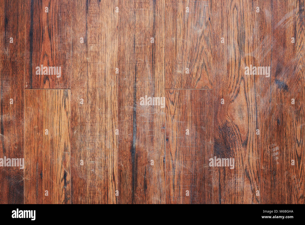 Dirty wooden floor. Brown wooden plank cover with dust Stock Photo