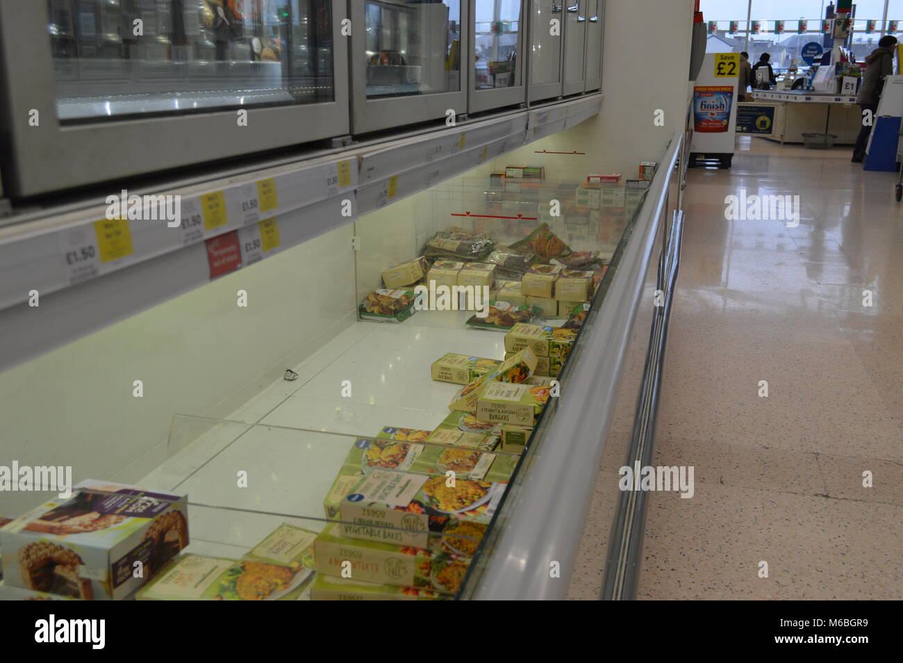 empty shelves in Tesco on a snow day panic buying Stock Photo Alamy