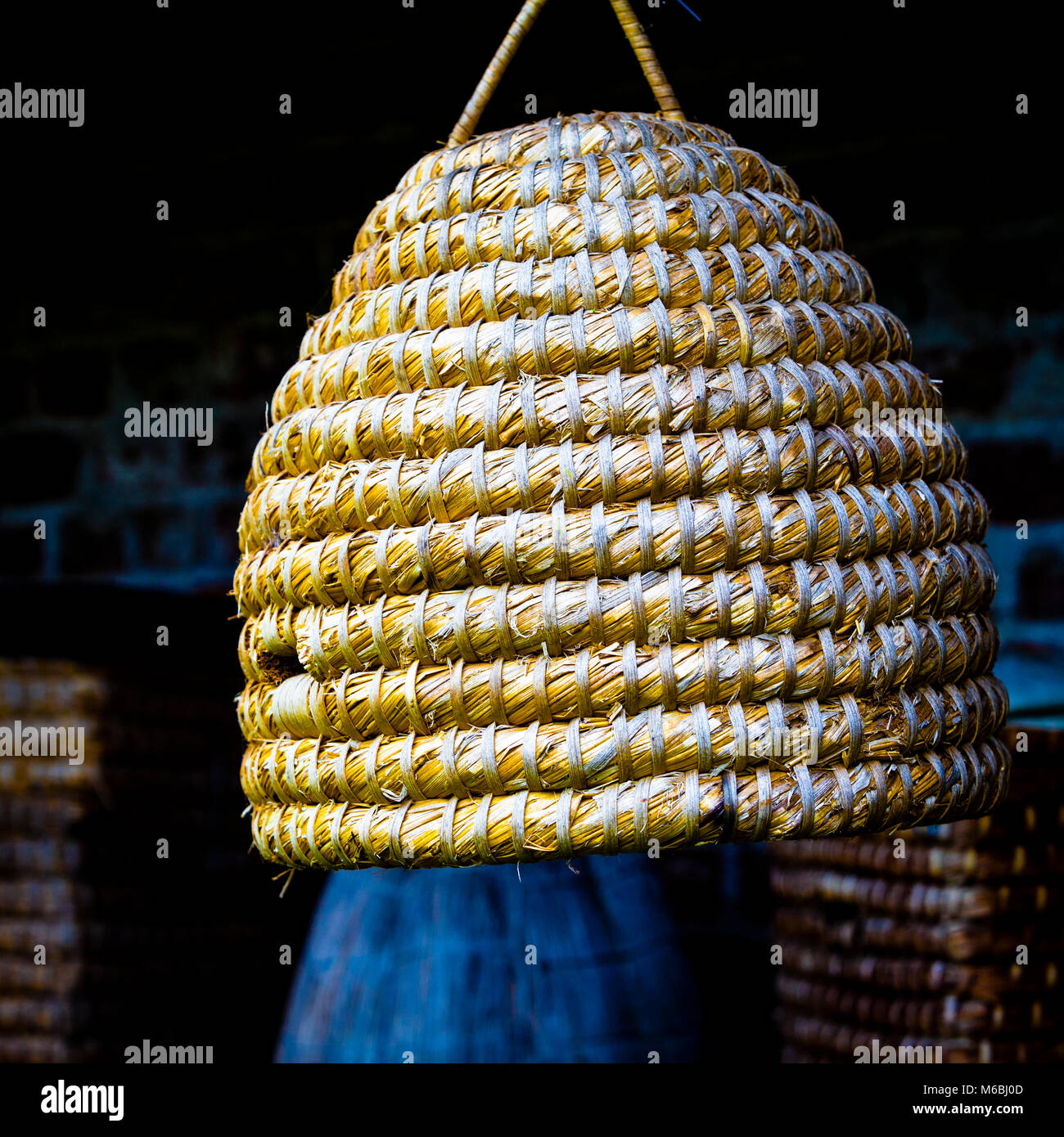 Traditional Bee Hive made of Raffia Stock Photo