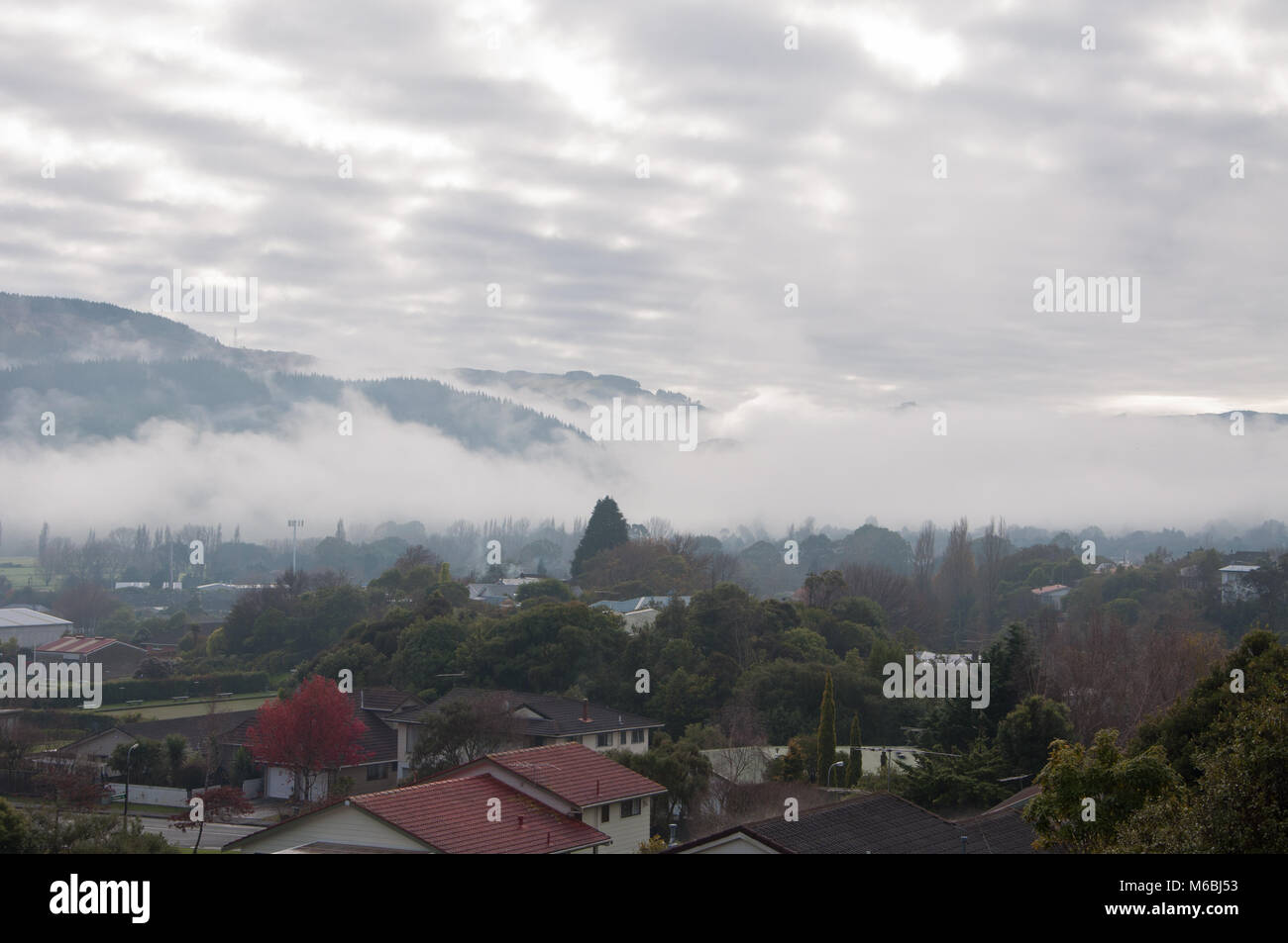 Low Cloud Over Suburb Stock Photo