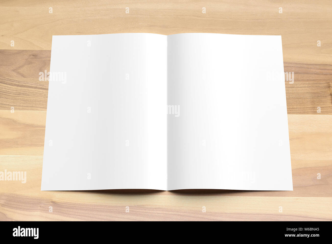 Blank Bi fold A4 size brochure mock up on wooden background. 3D illustrating Stock Photo