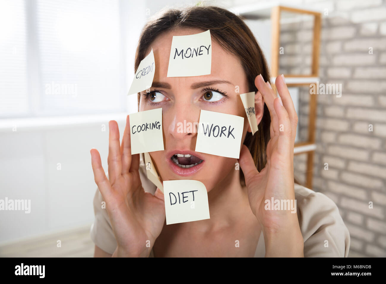 Close-up Of A Young Woman With Many Sticky Notes On Her Face Stock ...