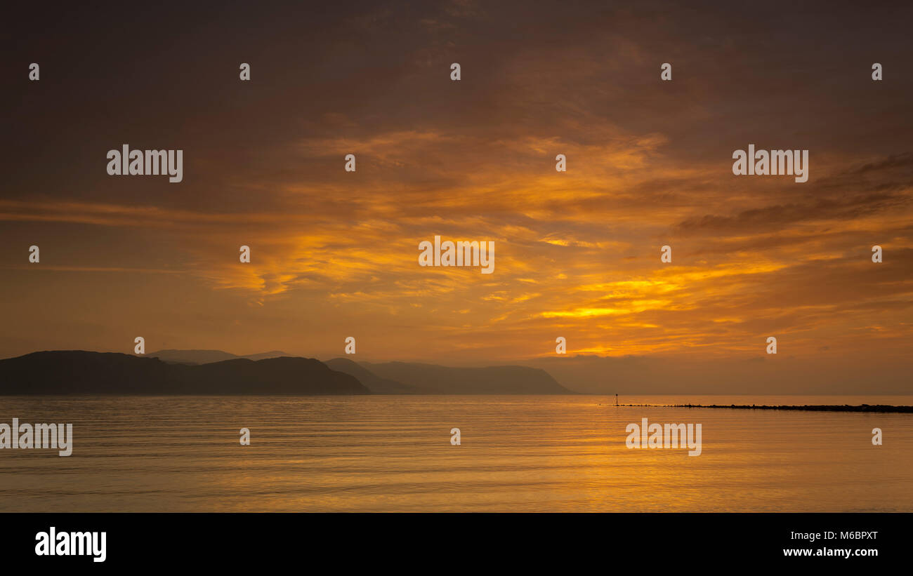 Colourful Clouds At Sunset On The North Wales Coast Stock Photo Alamy colourful-clouds-at-sunset-on-the-north-wales-coast-stock-photo-alamy