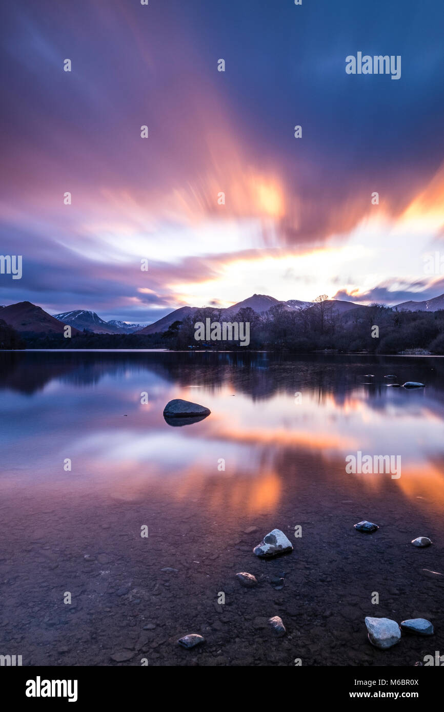 Clouds moving across the sky on a windy day in the Lake District at Keswick by the shore of Derwentwater. Stock Photo