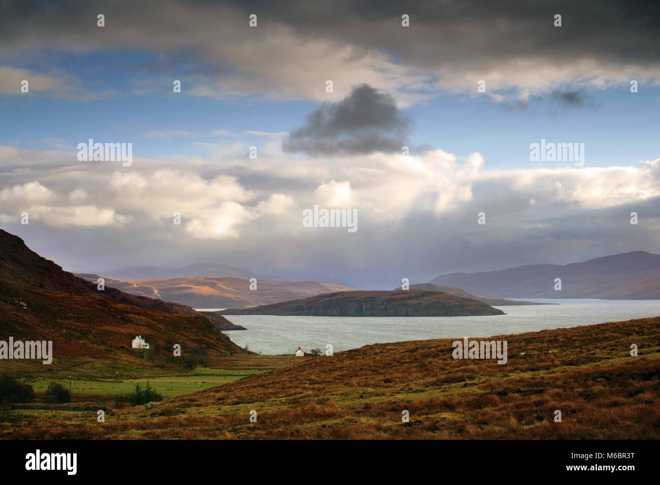 A winter view across the Wester Ross coast looking towards Loch Broom as clouds gather. Stock Photo