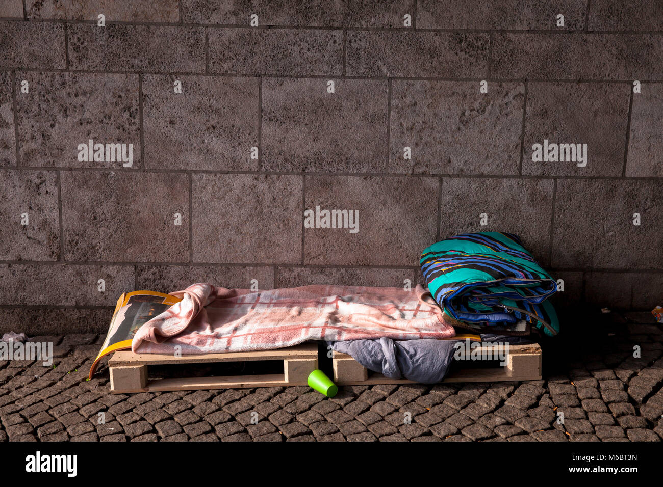 sleeping berth of a homless person under the Deutzer bridge, Cologne, Germany.  Schlafplatz eines Obdachlosen unter der Deutzer Bruecke, Koeln, Deutsc Stock Photo