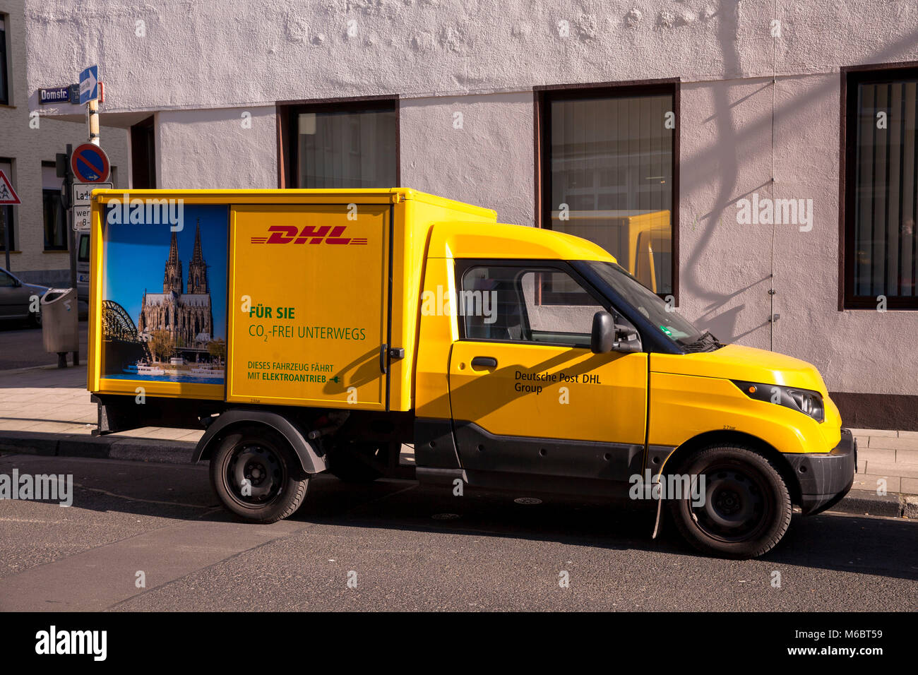 Germany, Cologne, DHL parcel service electric vehicle Streetscooter.  Deutschland, Koeln, DHL- Elektrofahrzeug Streetscooter. Stock Photo