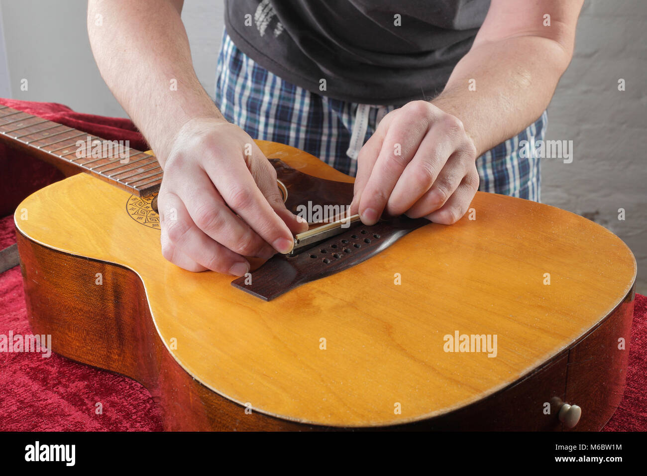 Musical instrument guitar repair and service Grinding bridge nut