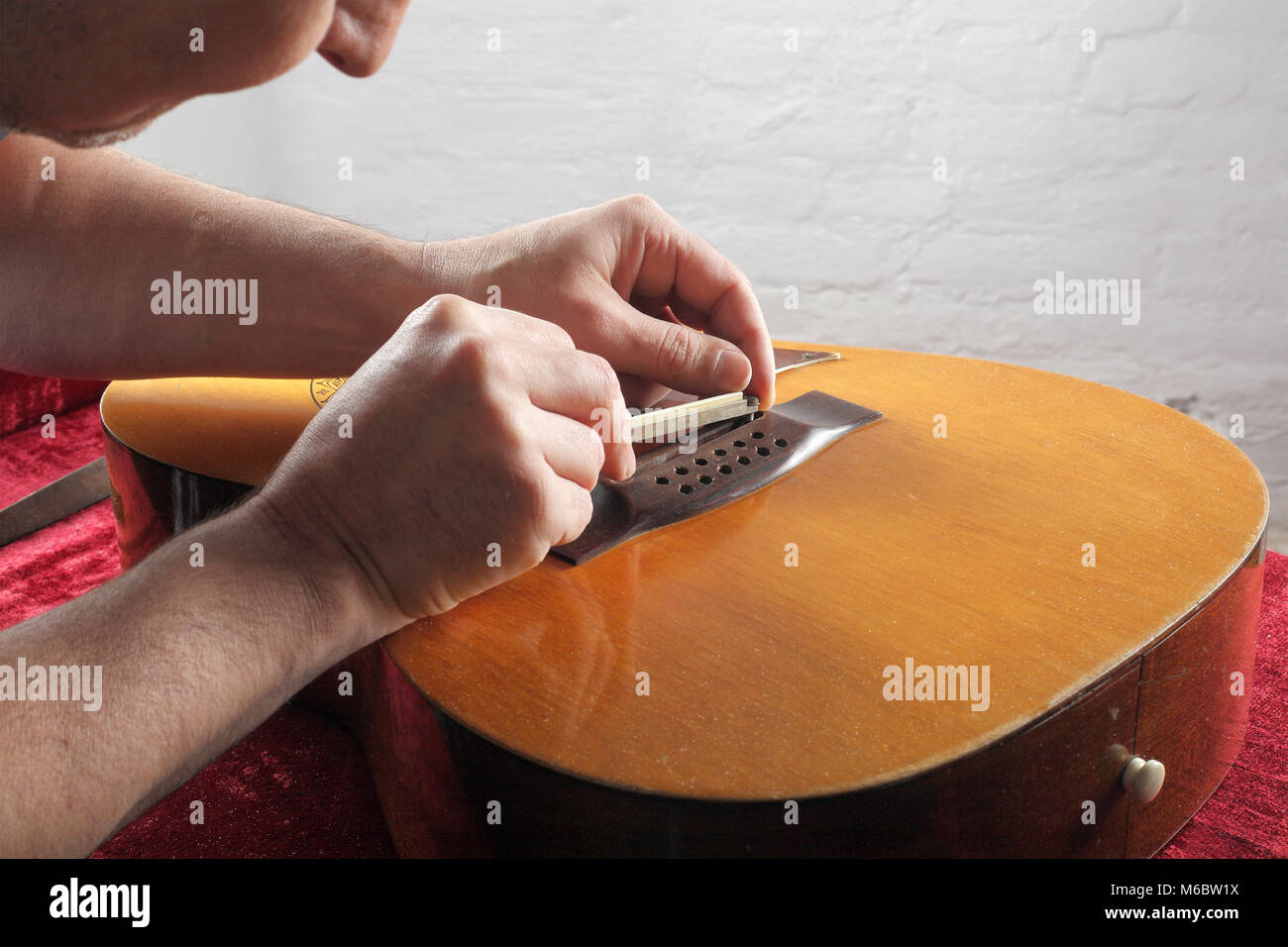 Musical instrument guitar repair and service Grinding bridge nut