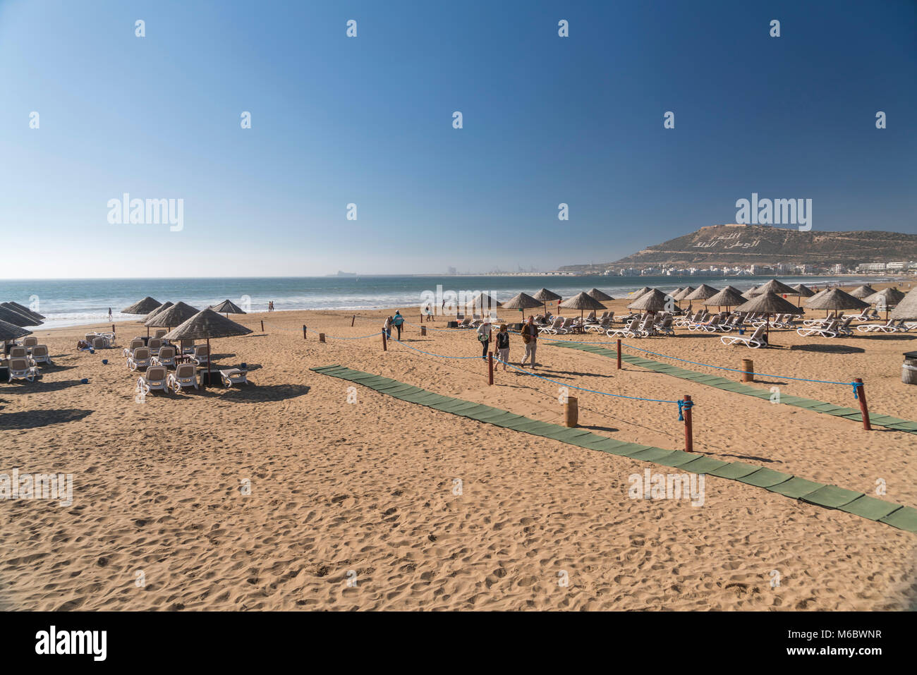 Sandstrand in Agadir, Königreich Marokko, Afrika  |  at the beach in Agadir, Kingdom of Morocco, Africa Stock Photo