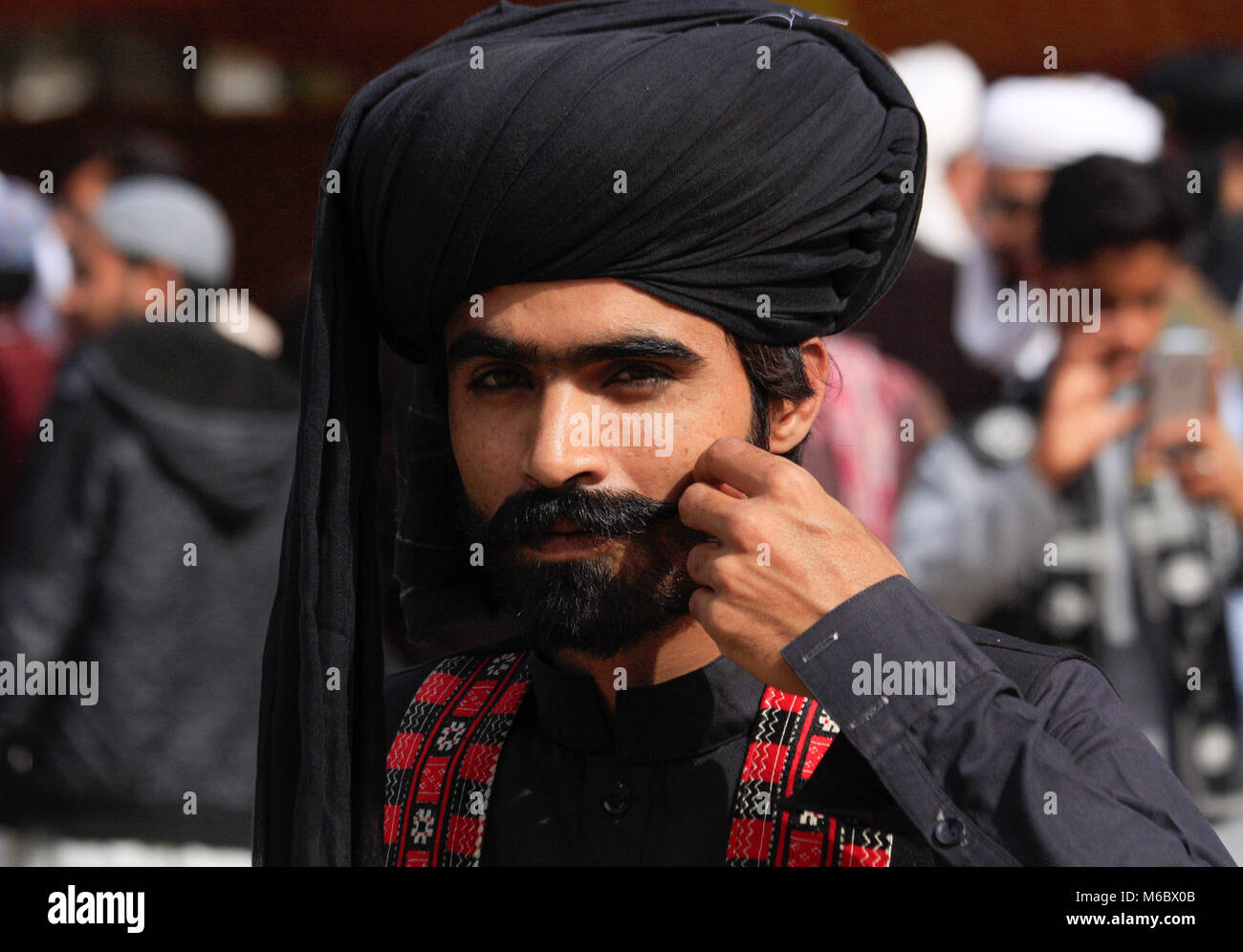 Quetta, Pakistan. 02nd Mar, 2018. People wear traditional Balochi Dress