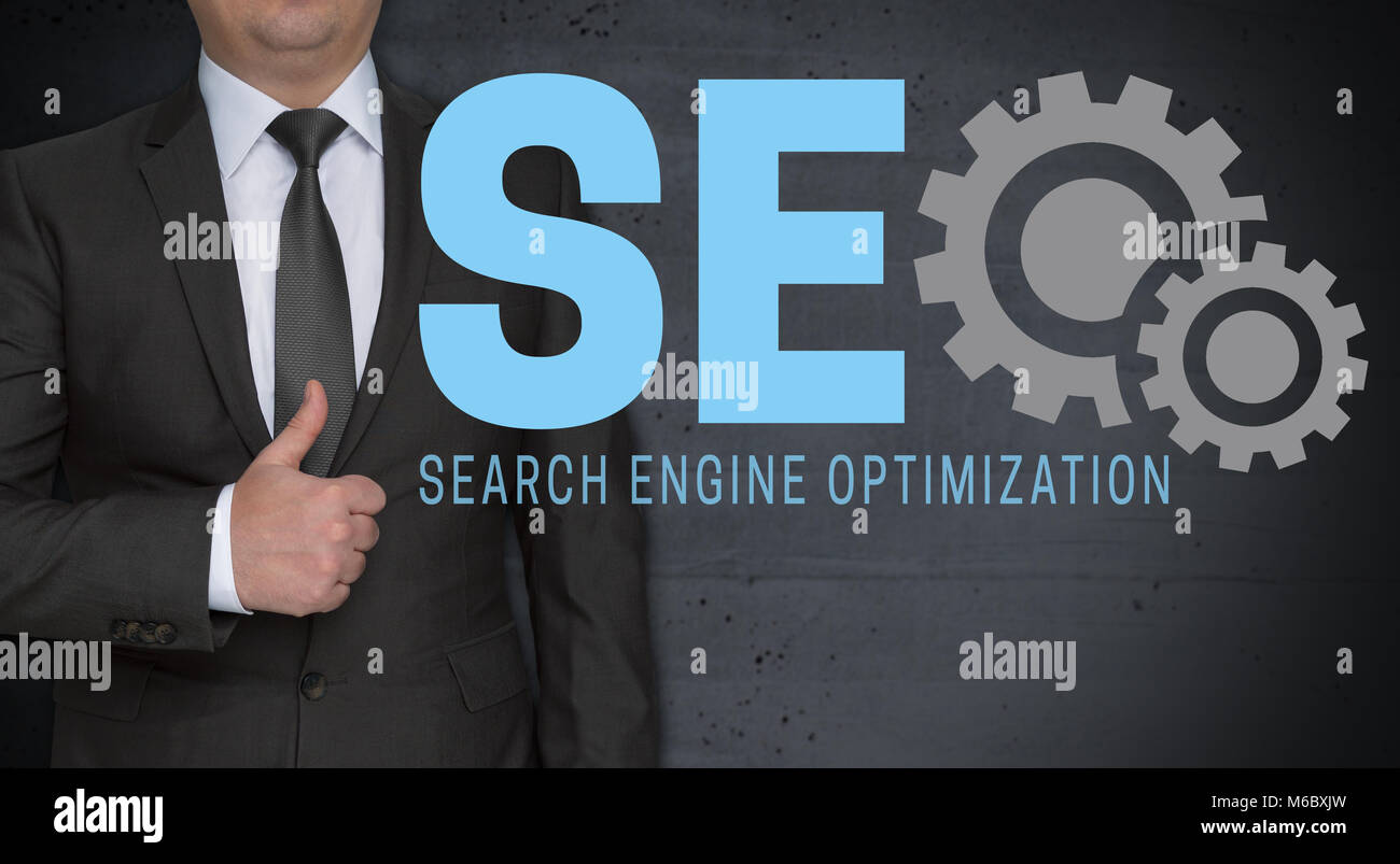 SEO concept and businessman with thumbs up. Stock Photo
