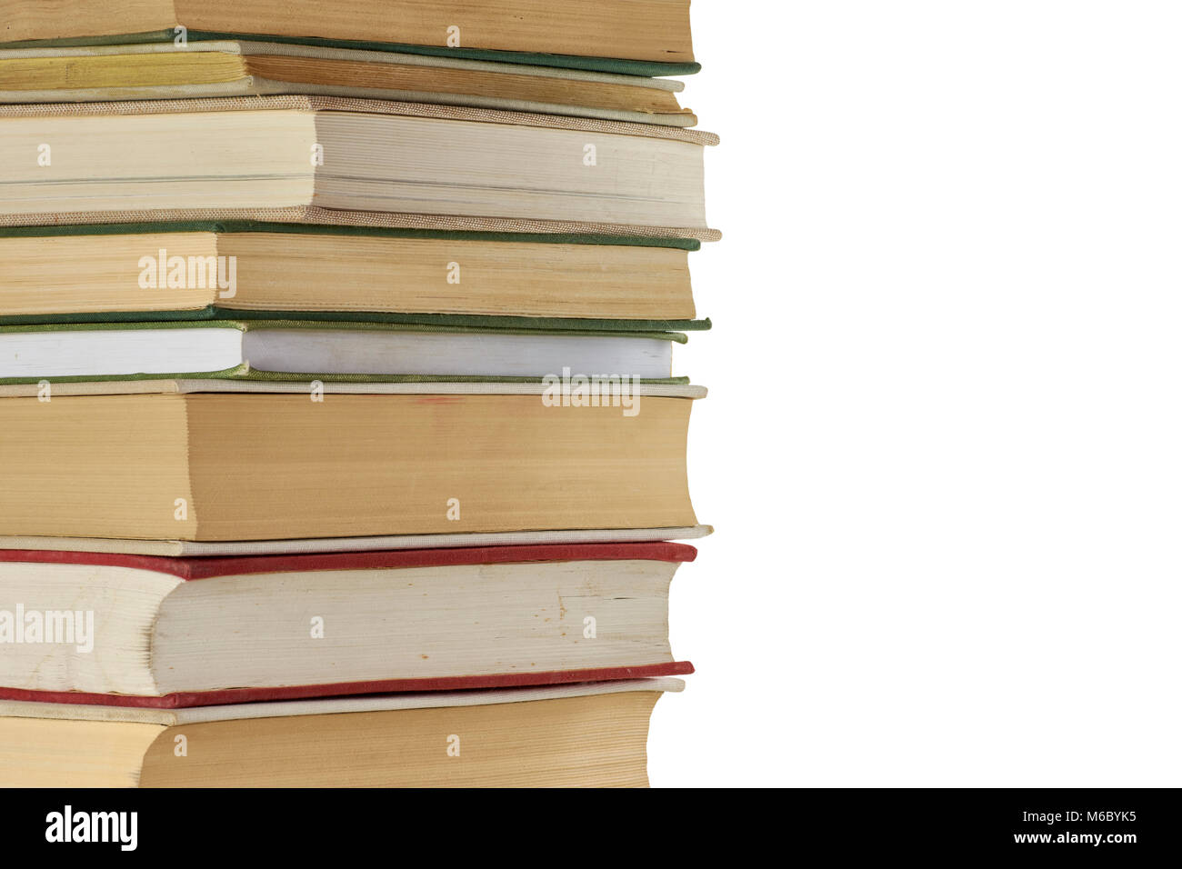 Stack of old closed books, isolated on a white background Stock Photo