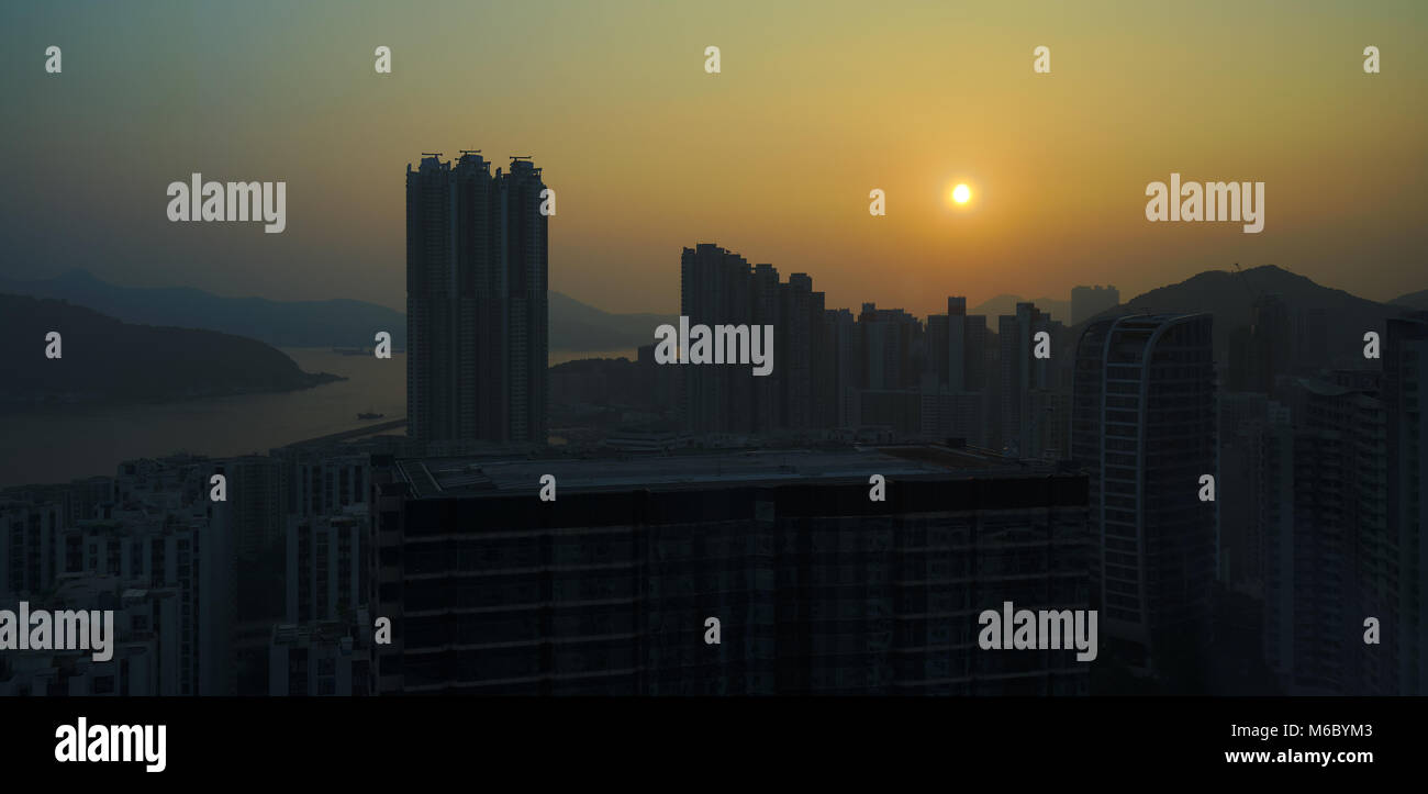 North Point sunrise from Tai Koo, Hong Kong, China Stock Photo
