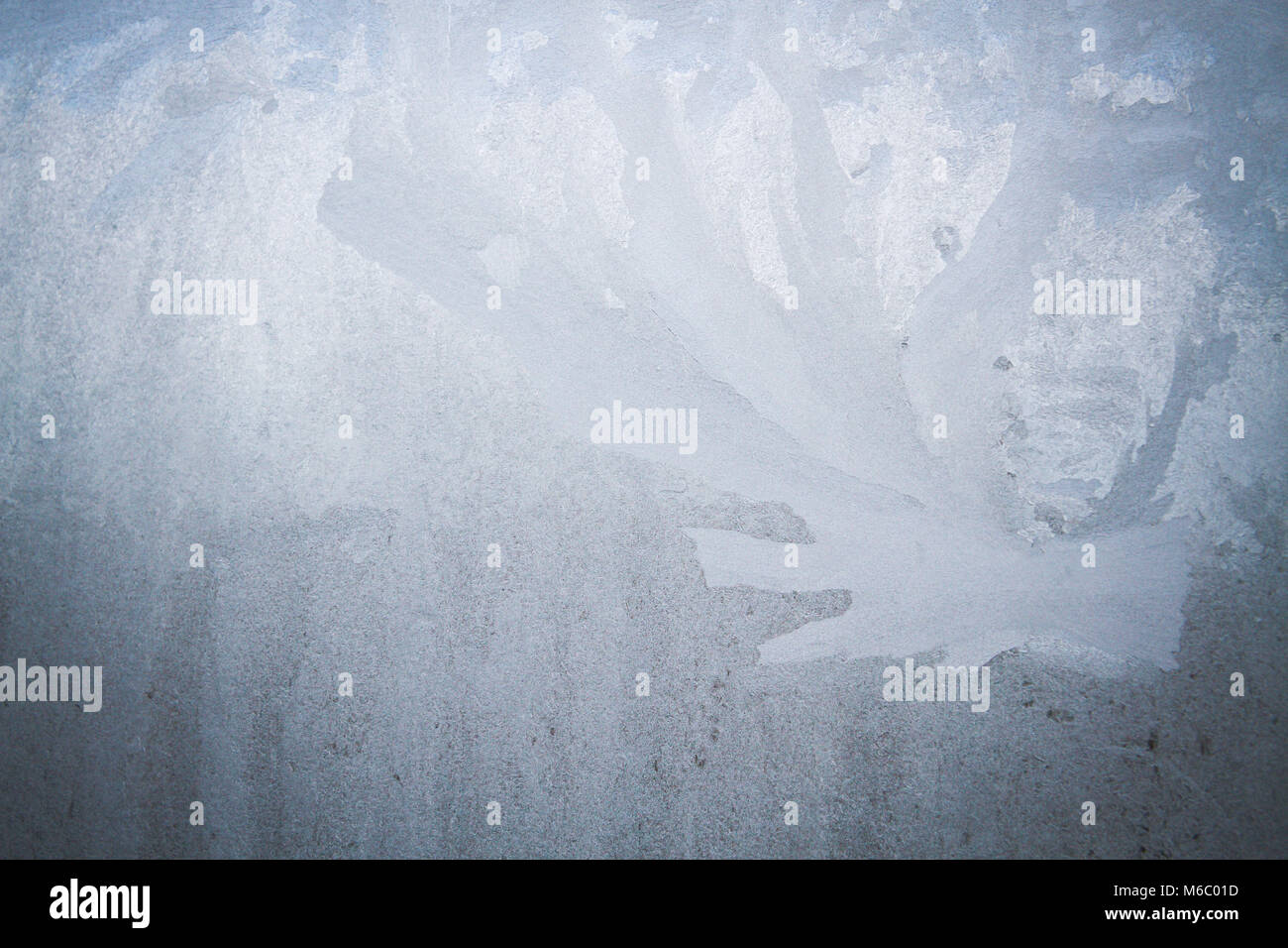 Winter frosty patterns on the frozen ice window Stock Photo - Alamy