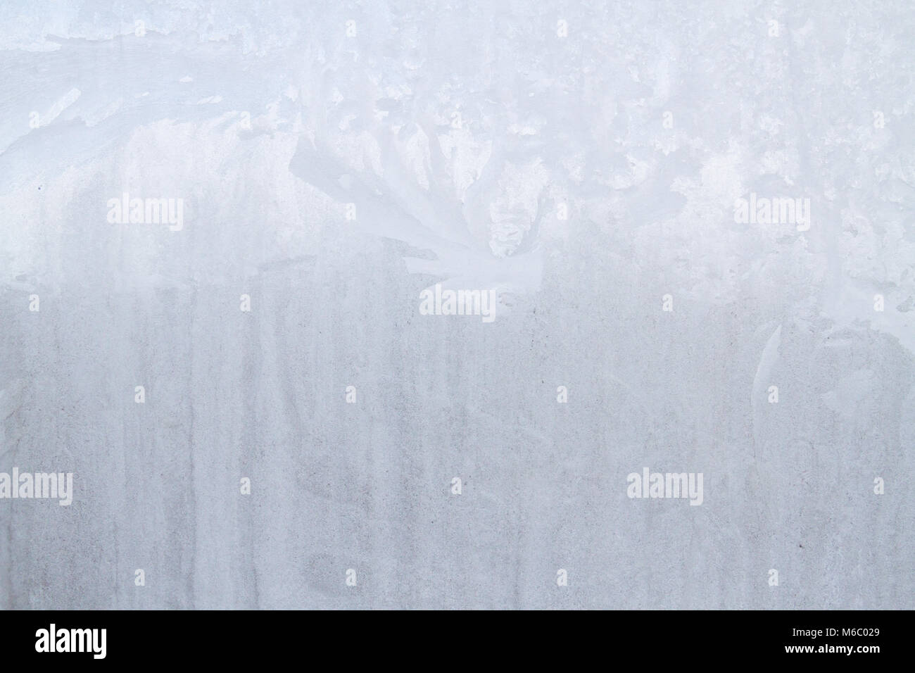Winter frosty patterns on the frozen ice window Stock Photo - Alamy