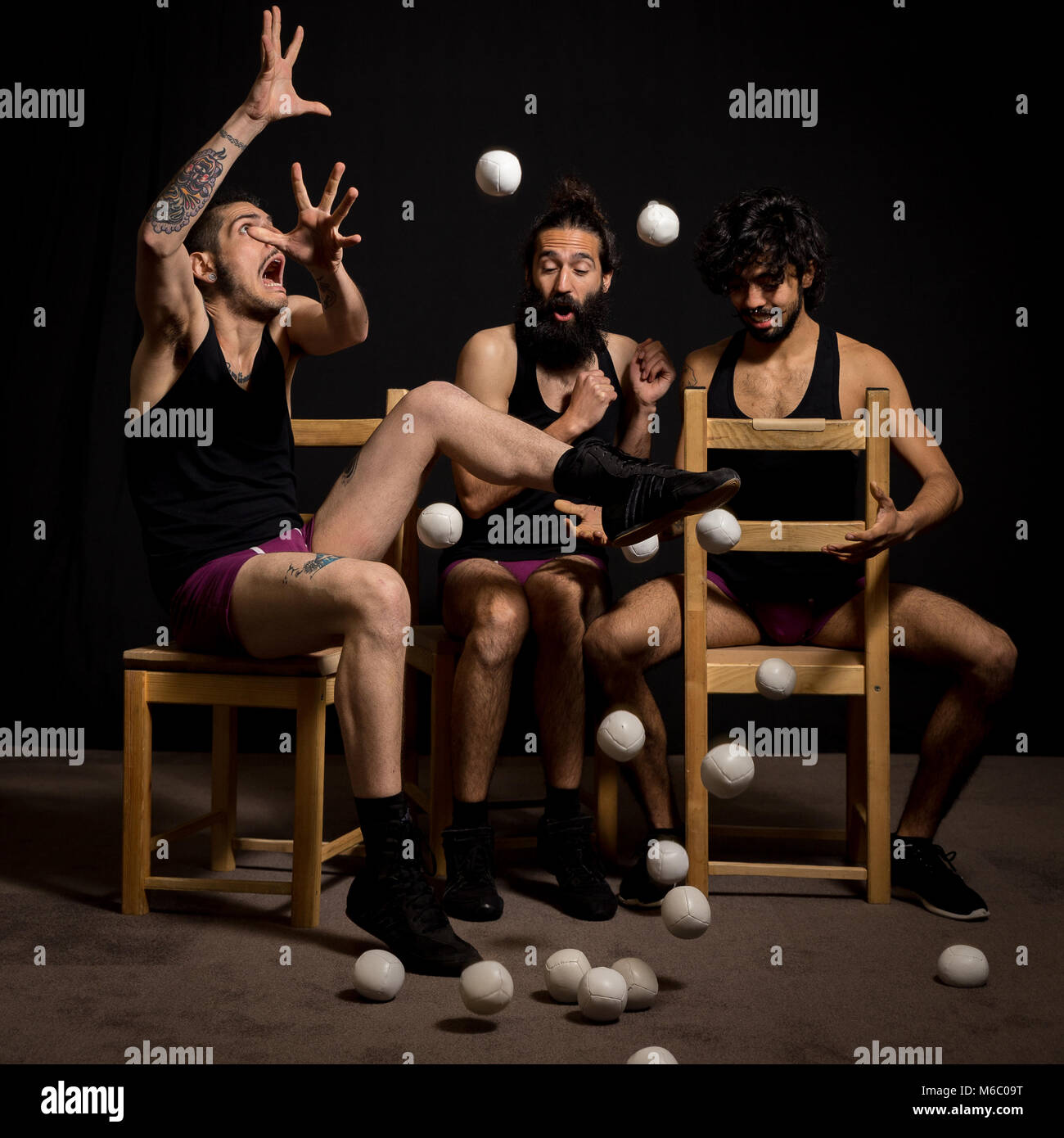 Comedy actors and jugglers having fun during their show at the circus ...