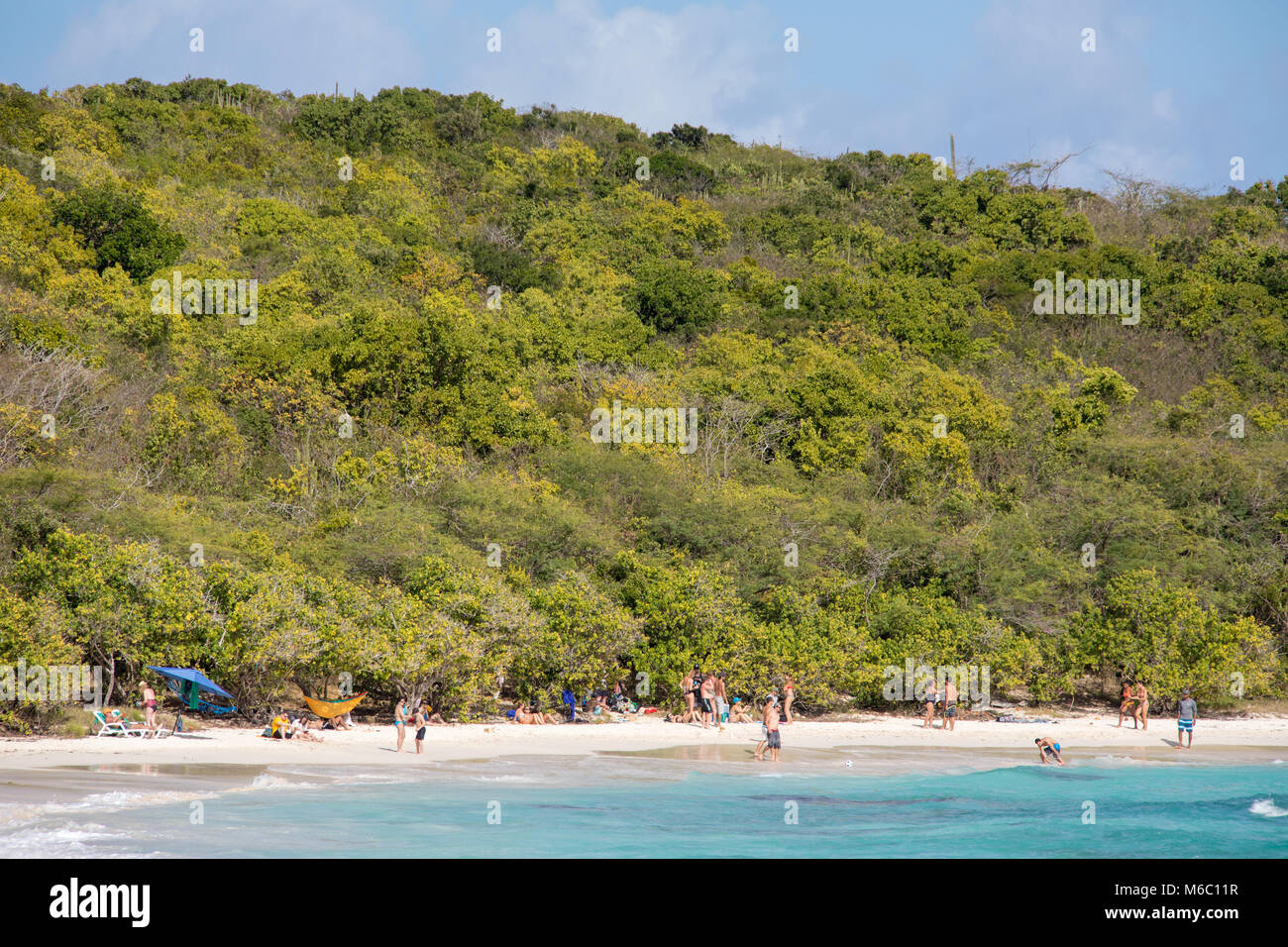 Tourists at Half Moon Bay Beach, Antigua Stock Photo