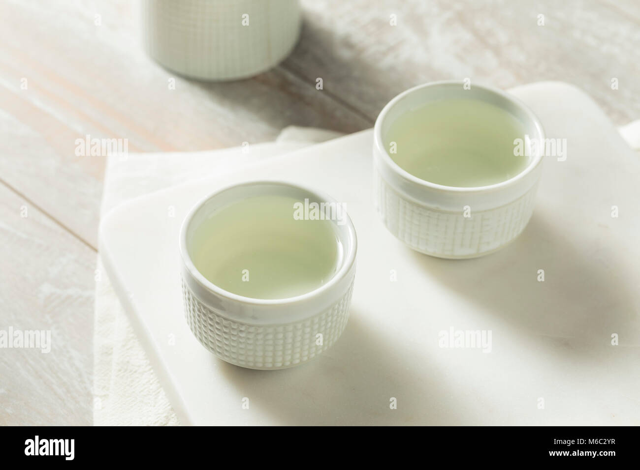 Alcoholic Japanese Sake Rice Wine in a Ceramic Glass Stock Photo Alamy