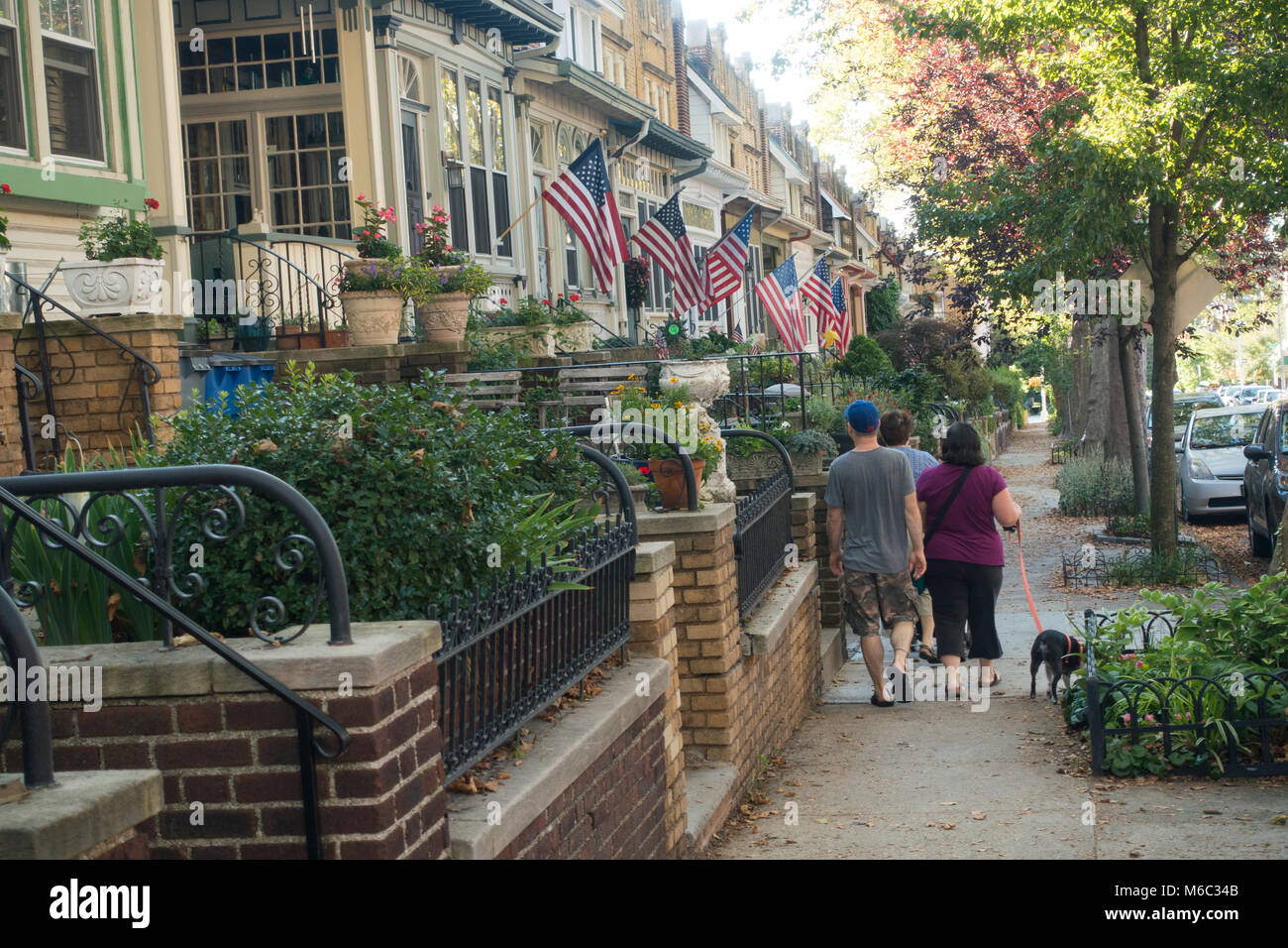 couple walking down street in Windsor Terrace Brooklyn Stock Photo Alamy
