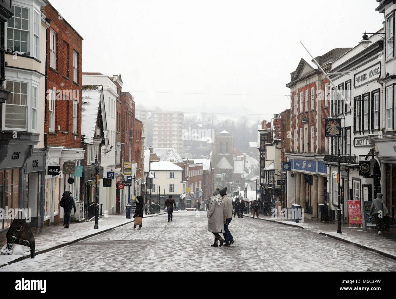 A dusting of snow covers Guildford High Street, as the severe weather