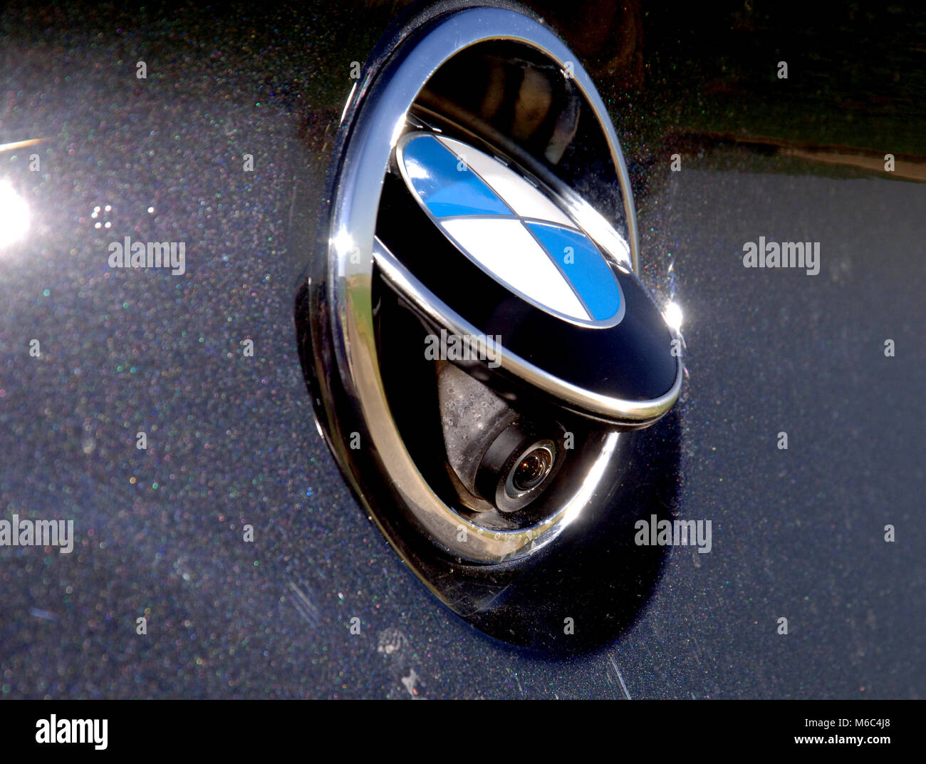 reversing camera behind the badge on a 2011 BMW 640i 6 Series convertible premium German car Stock Photo