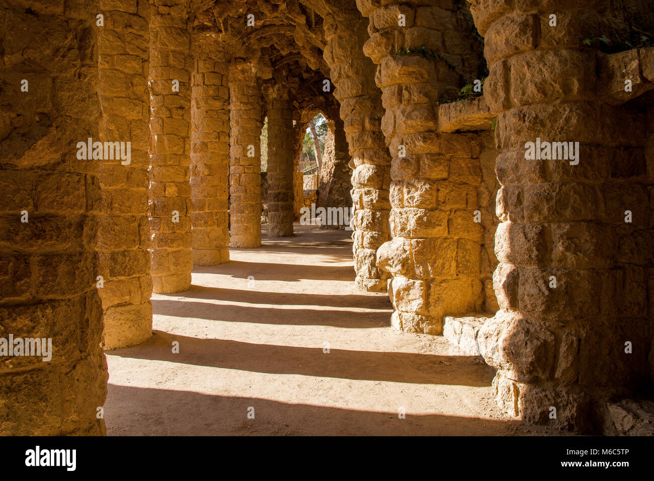 shaded stone pillars in Barcelona Stock Photo
