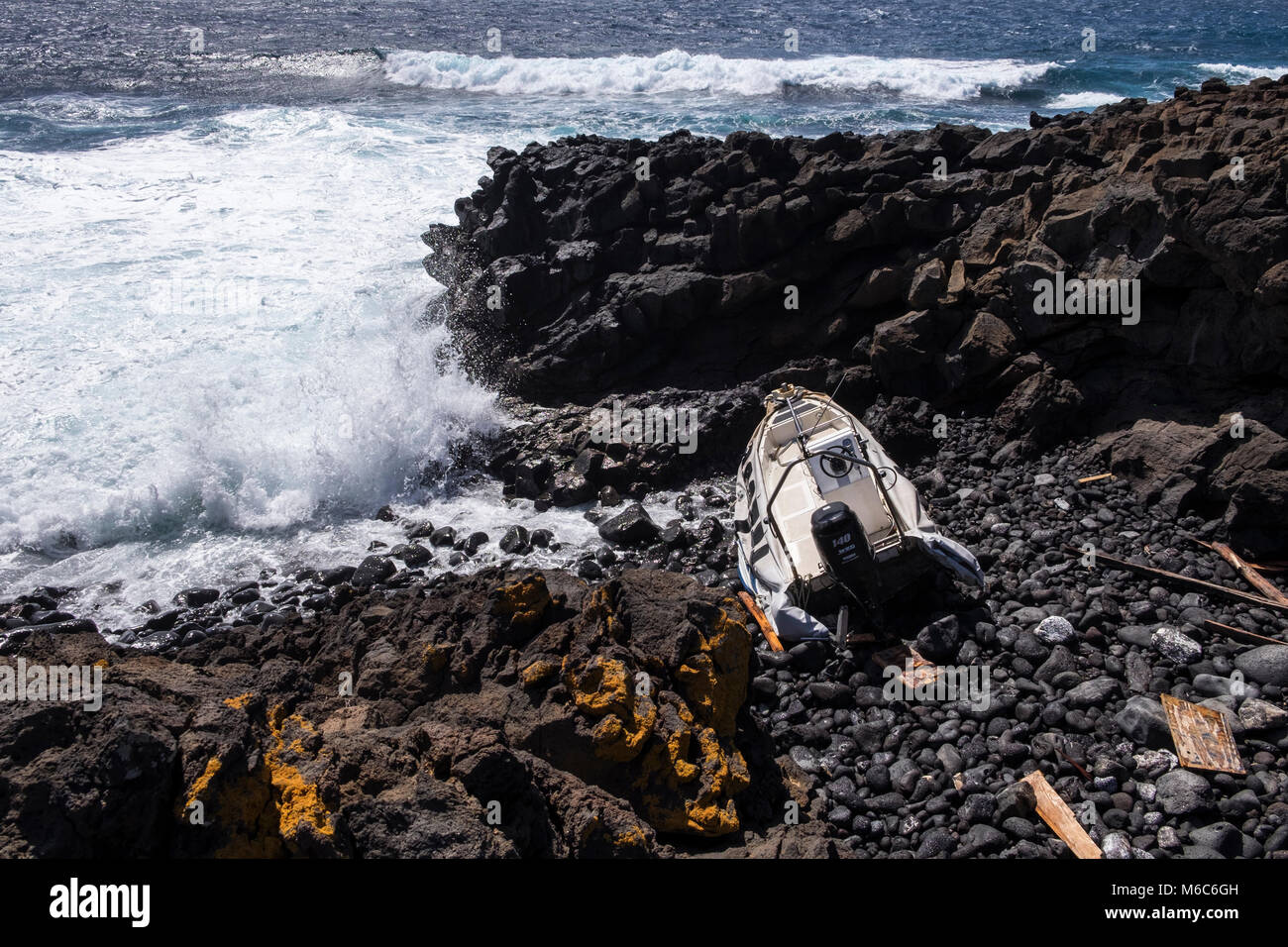 El Palm Mar, rib, rigid inflatable boat, wrecked on the rocks with