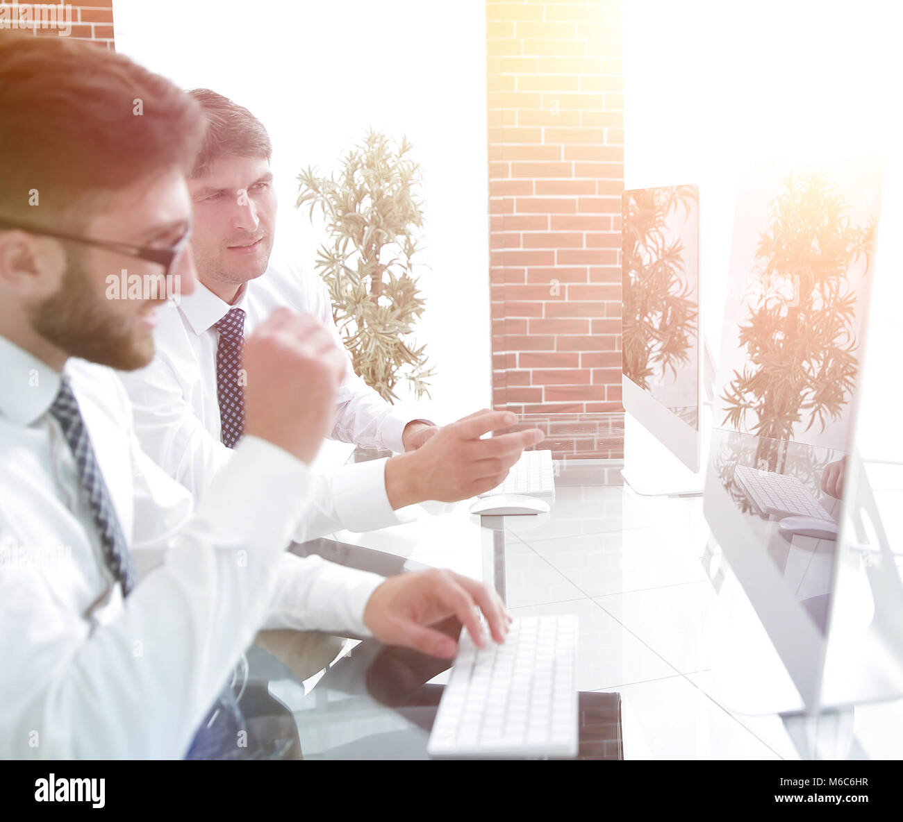 Employees of the company in the computer room Stock Photo - Alamy