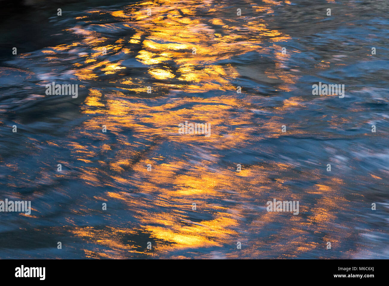blurred reflection of light on the water Stock Photo - Alamy