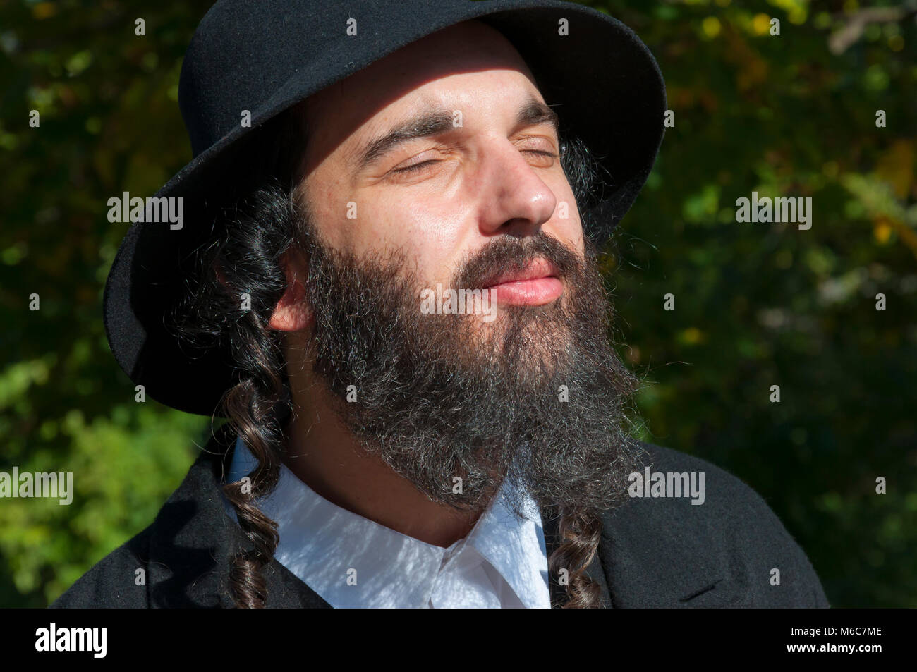 Outdoor Sunny Bright Portrait Of A Young Traditional Orthodox
