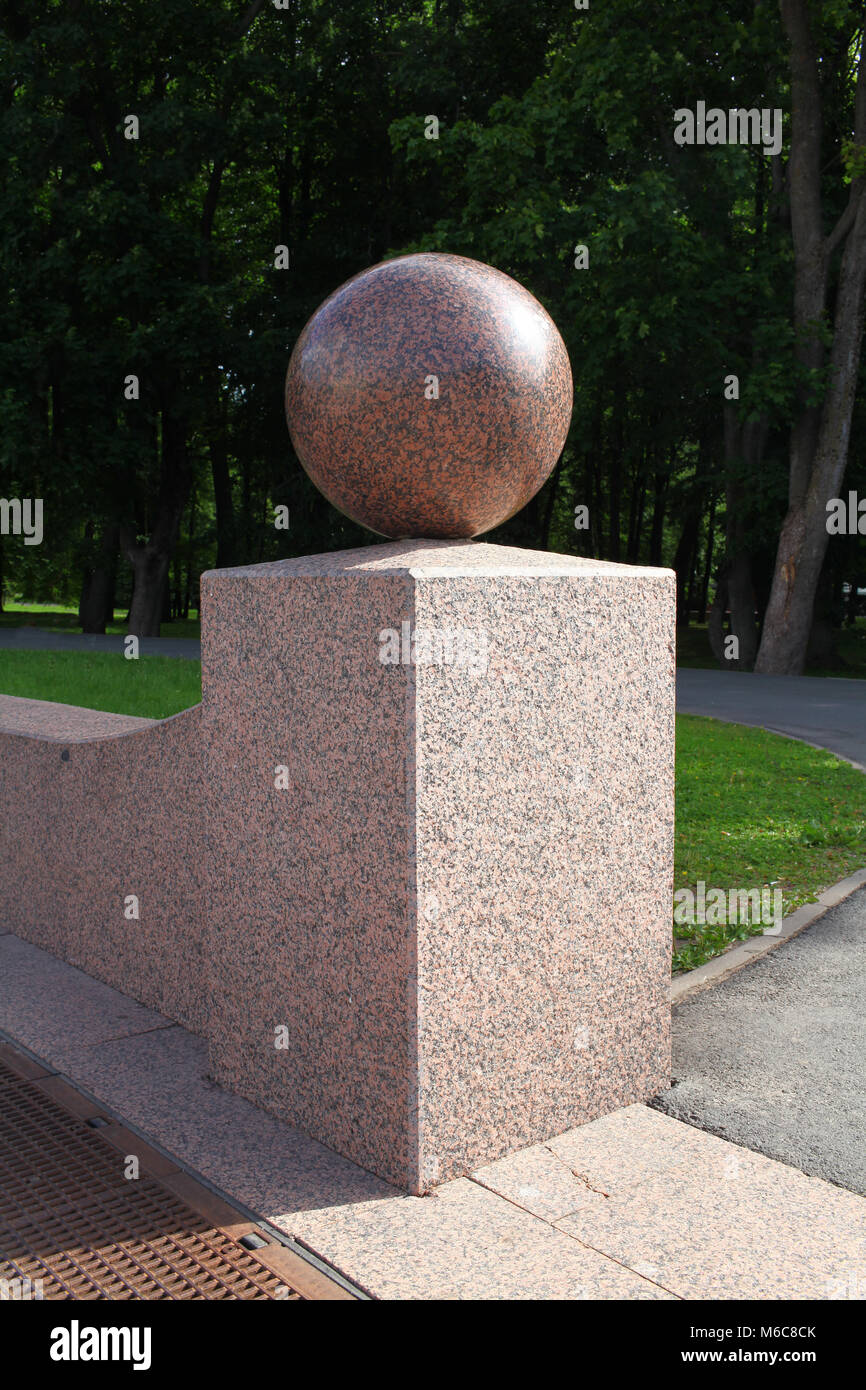 granite ball architectural garden element Stock Photo