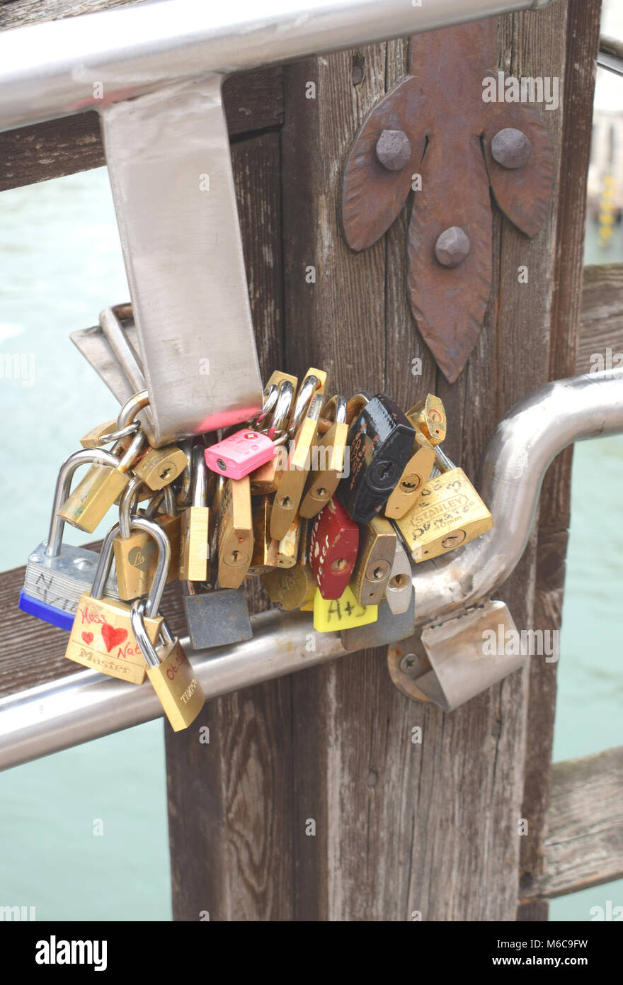 Love Locks on the Akademia Bridge over the Grand Canal in Venice Italy. Stock Photo